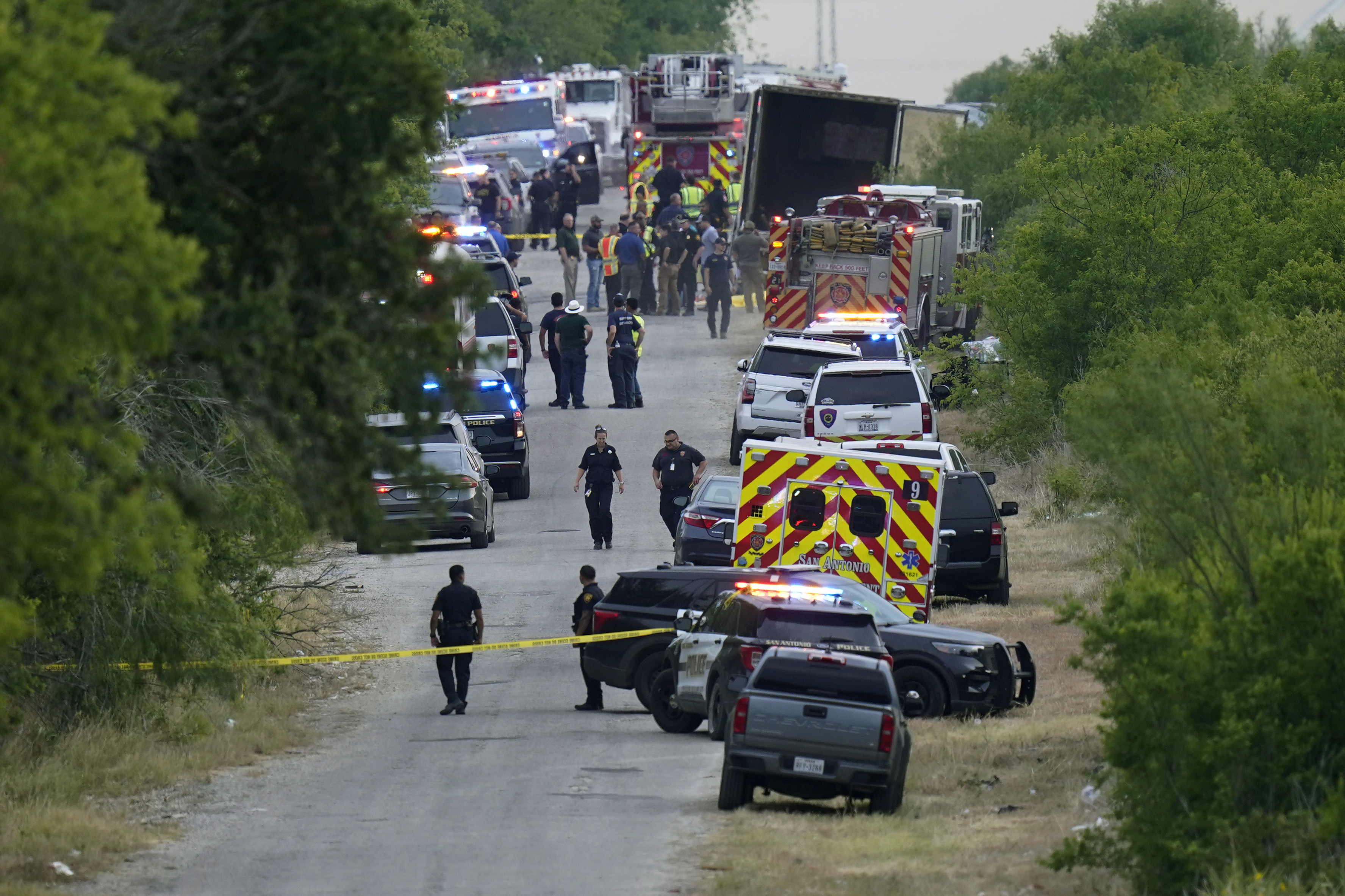 Photos: Dozens of suspected migrants found dead inside big-rig in San Antonio