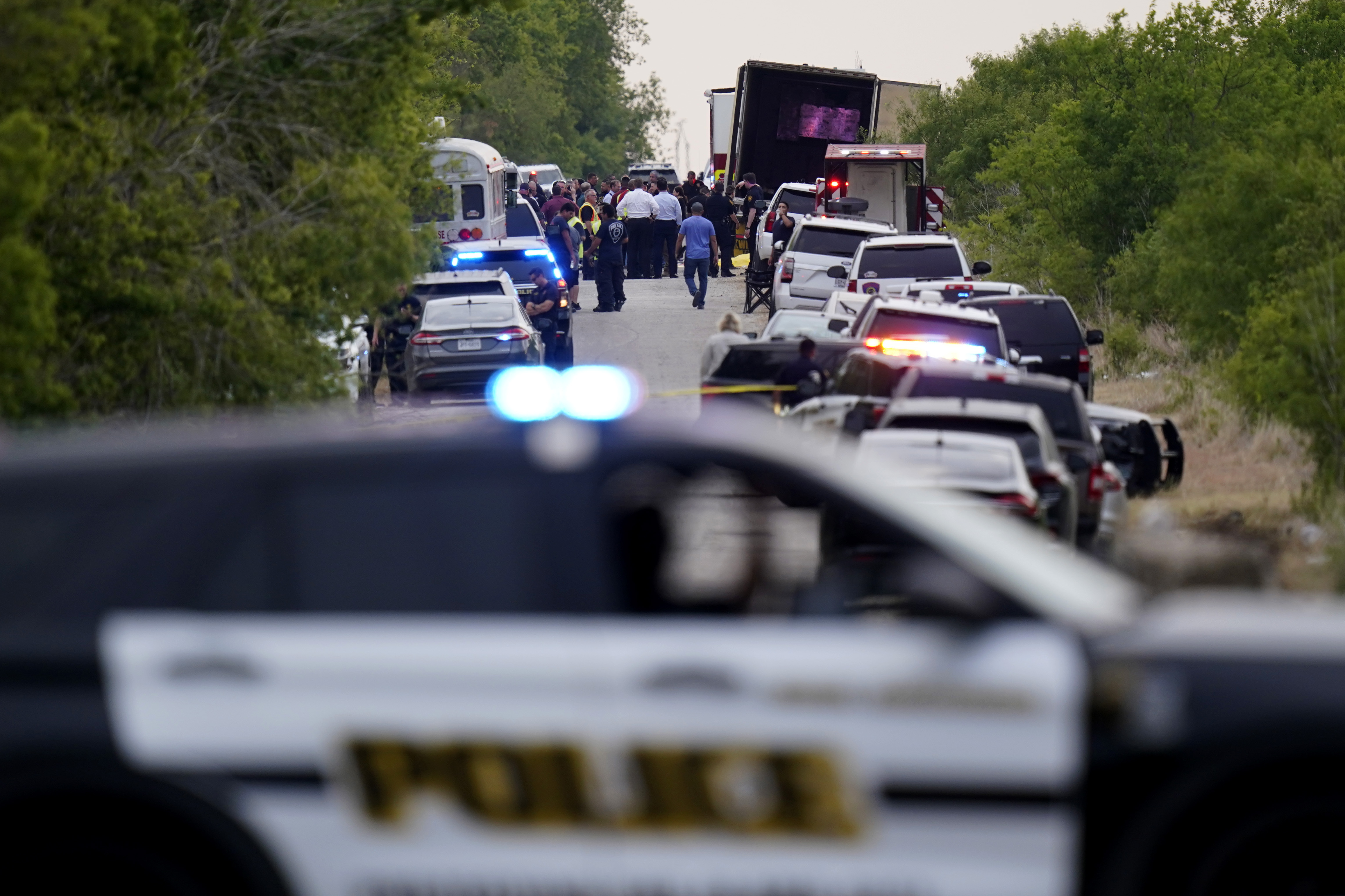 Photos: Dozens of suspected migrants found dead inside big-rig in San Antonio