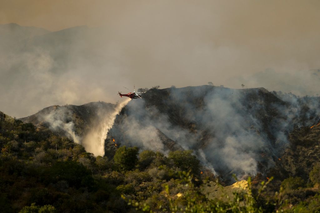 Photos: 'Palisades Fire' in California threatens homes, prompts evacuations