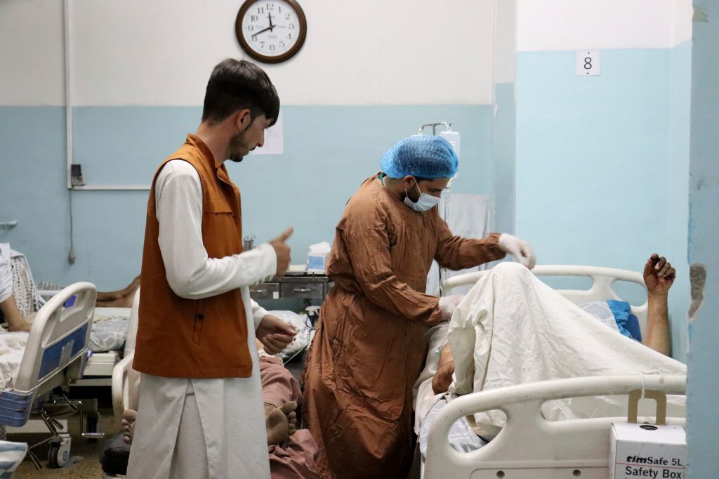 Photos: Kabul airport attack kills 13 US service members, dozens of Afghans