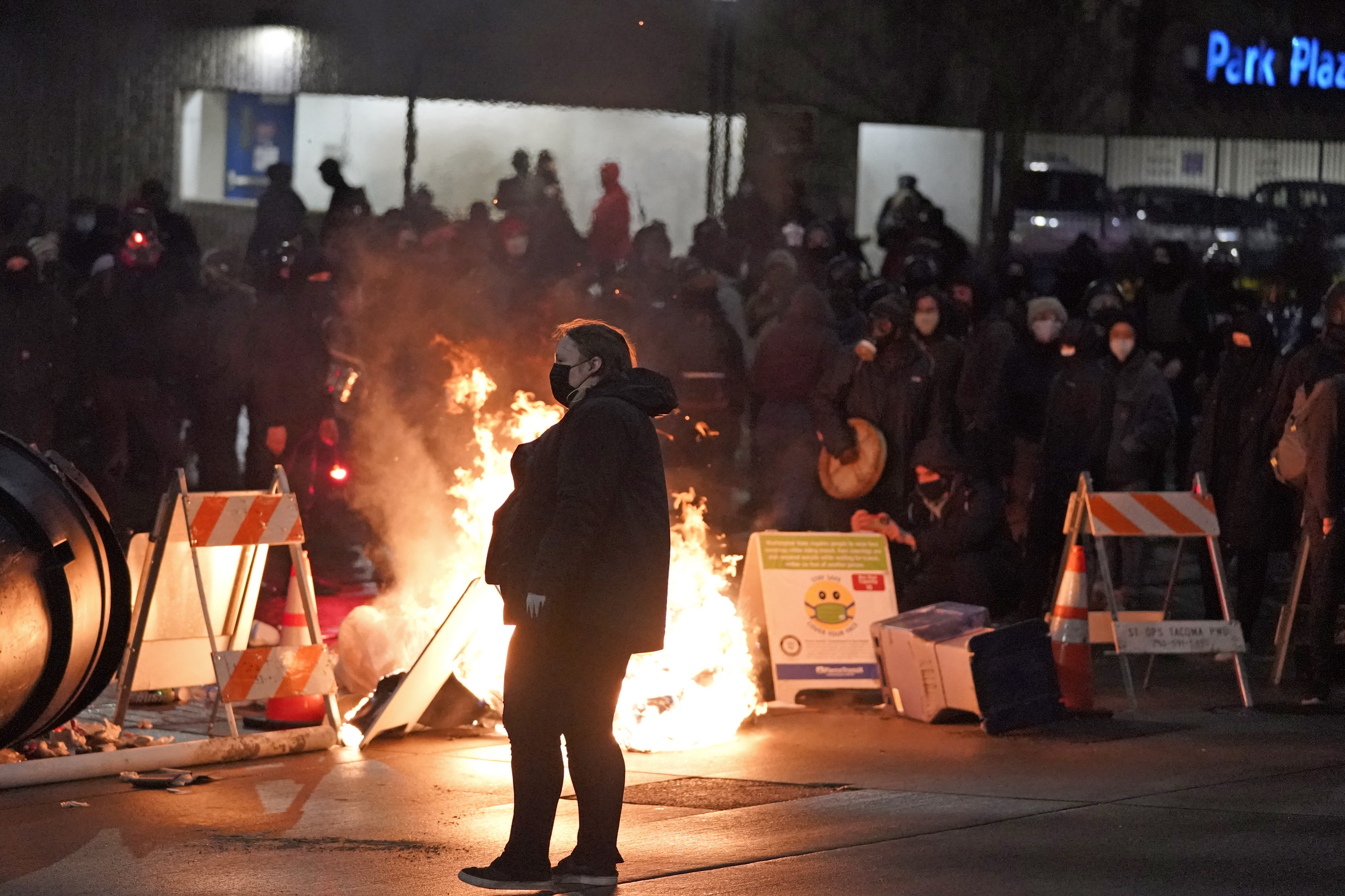 Photos: Protests erupt after police officer drives through crowd in Tacoma, Washington