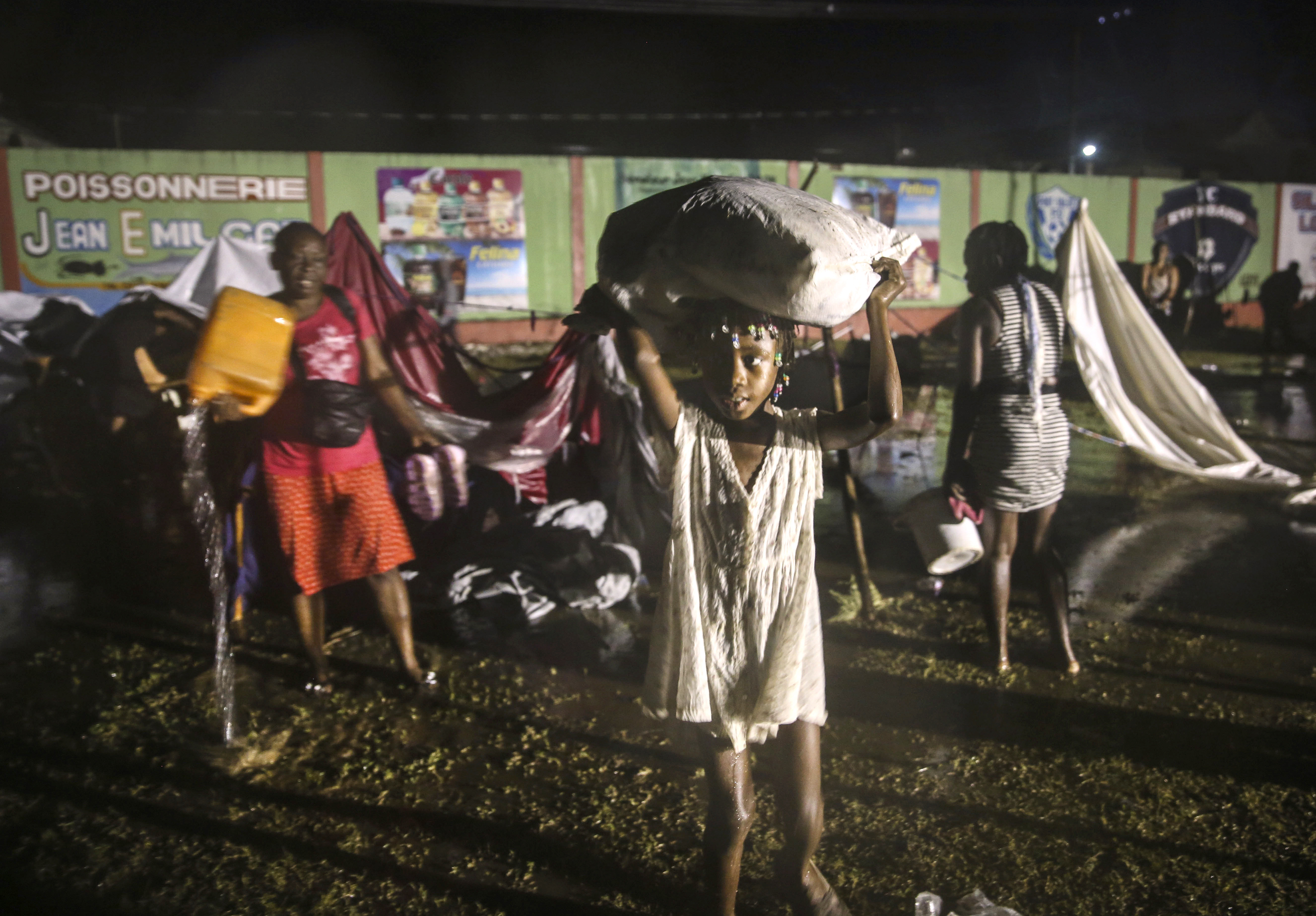 Photos: Tropical Depression Grace drenches earthquake-damaged Haiti