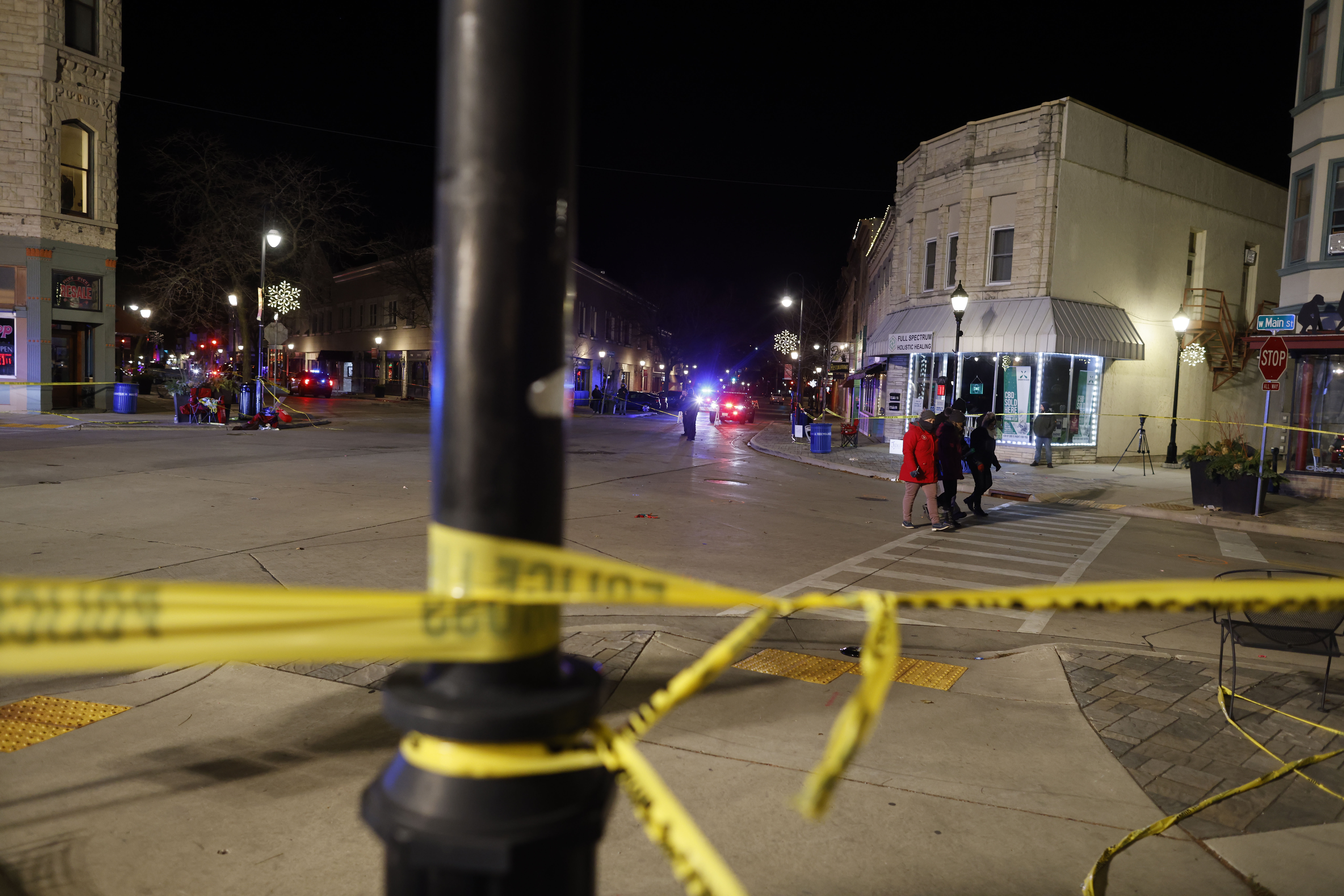 Photos: 5 dead, dozens hurt after SUV plows into Wisconsin holiday parade