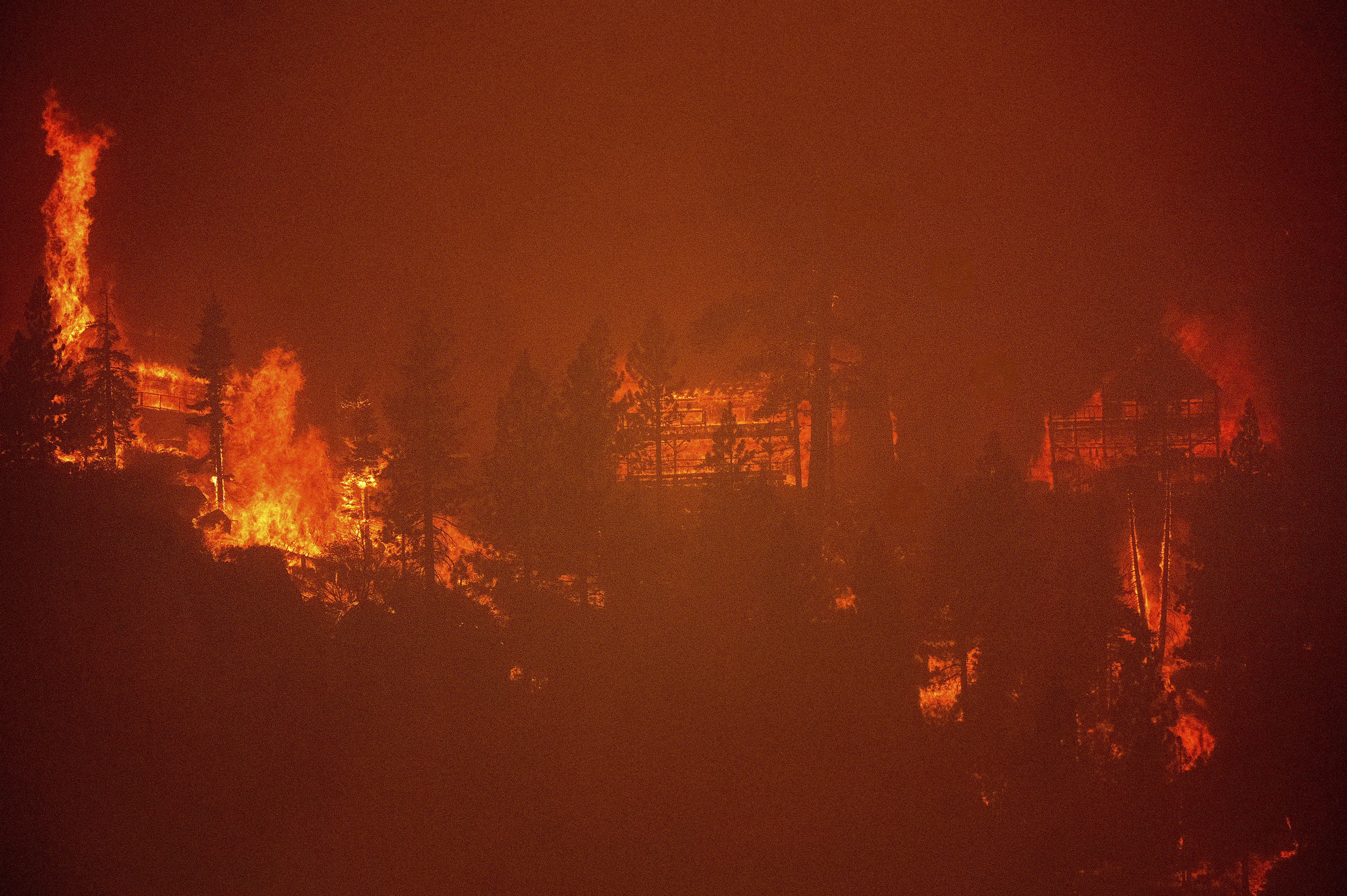 Photos: California's Caldor Fire triggers evacuations near Lake Tahoe