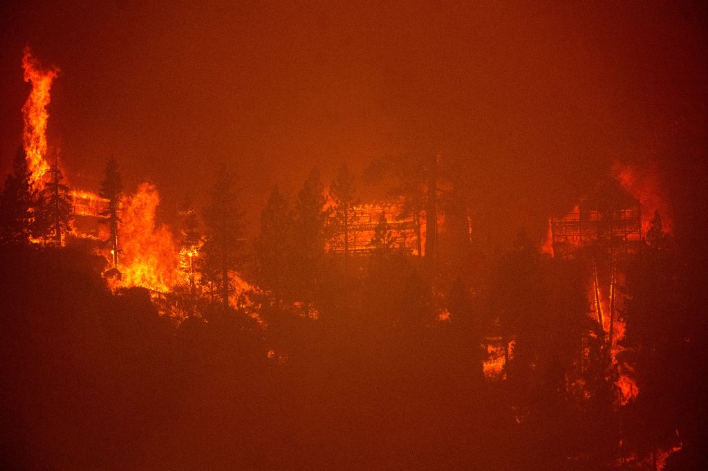 Photos: California's Caldor Fire triggers evacuations near Lake Tahoe