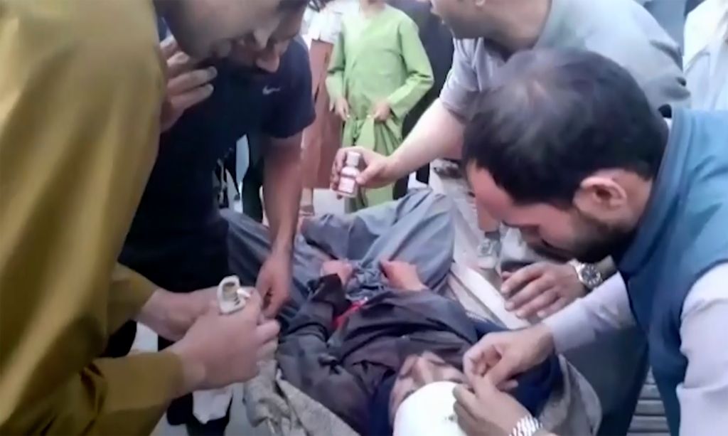Photos: Kabul airport attack kills 13 US service members, dozens of Afghans