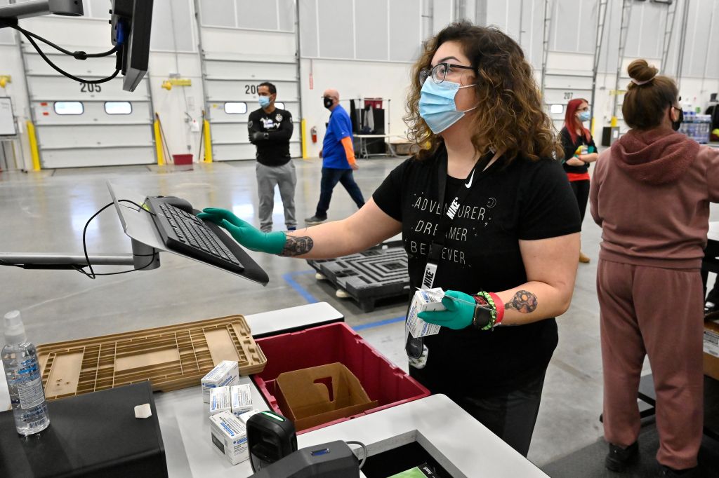 Photos: Johnson & Johnson ships millions of doses of coronavirus vaccine