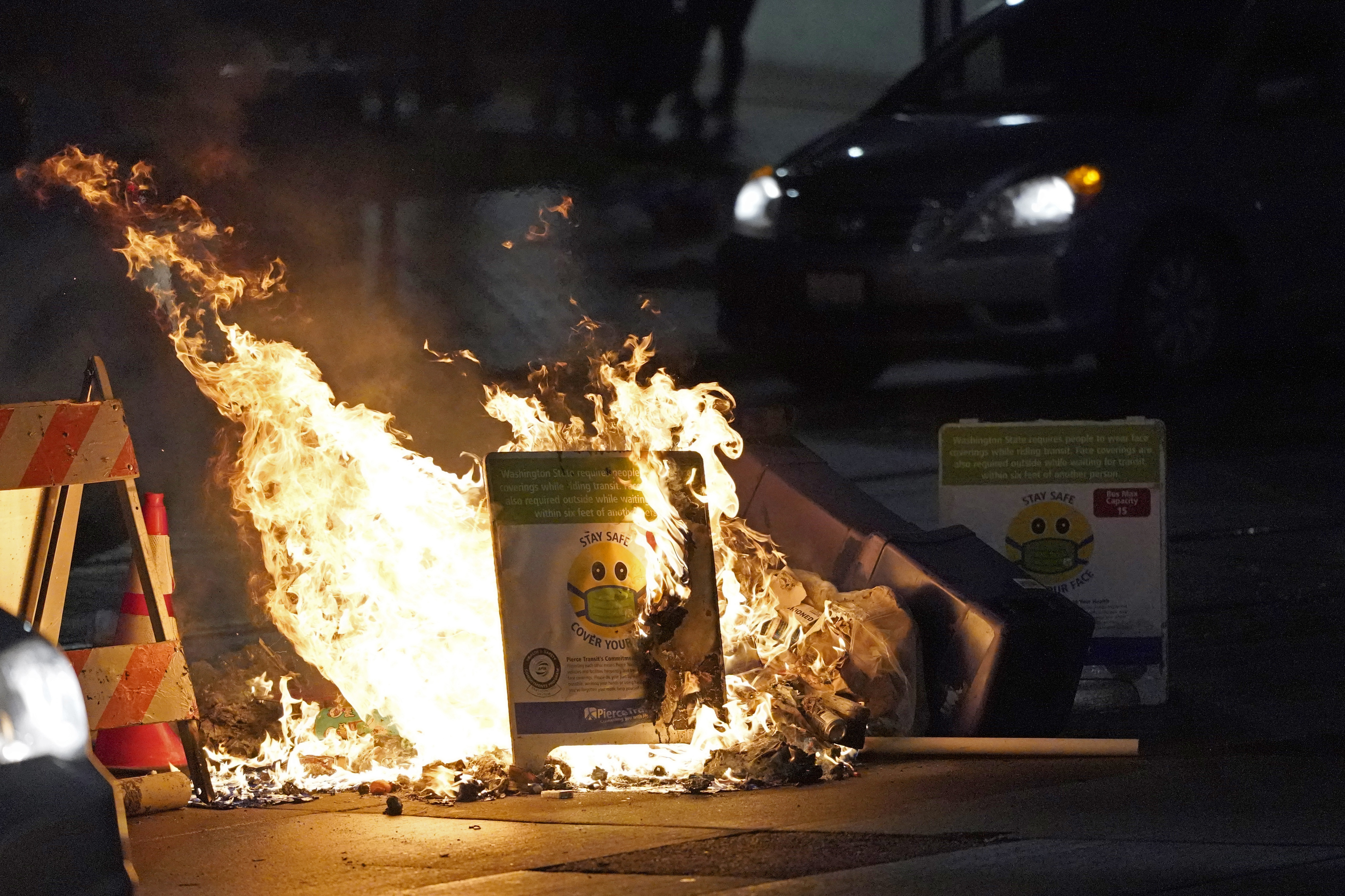 Photos: Protests erupt after police officer drives through crowd in Tacoma, Washington