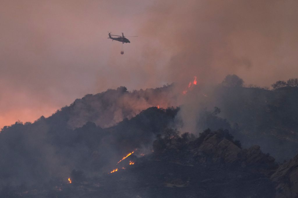 Photos: 'Palisades Fire' in California threatens homes, prompts evacuations