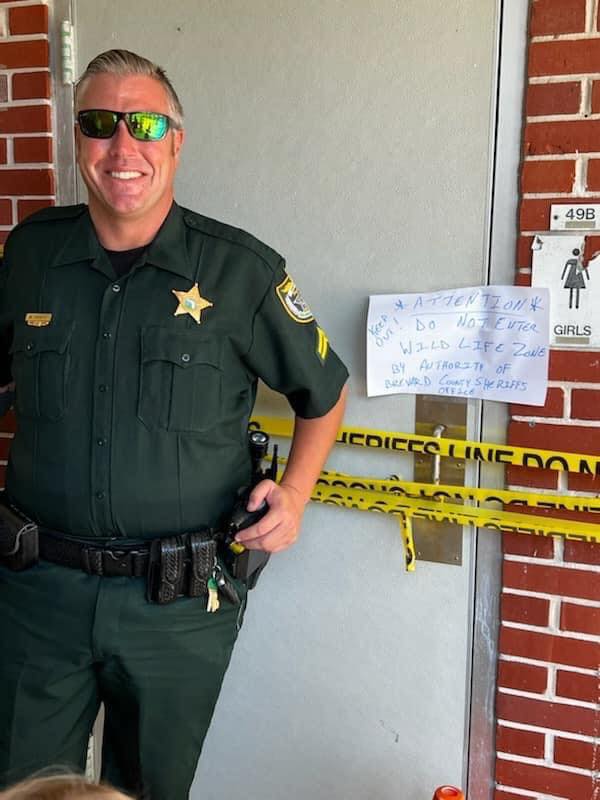 Deputy Swartz guards bathroom at Indialantic Elementary