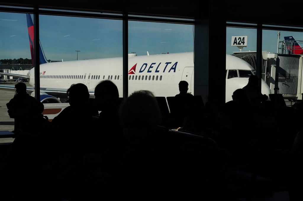 Photos: Thanksgiving travelers flock to airports, freeways ahead of holiday