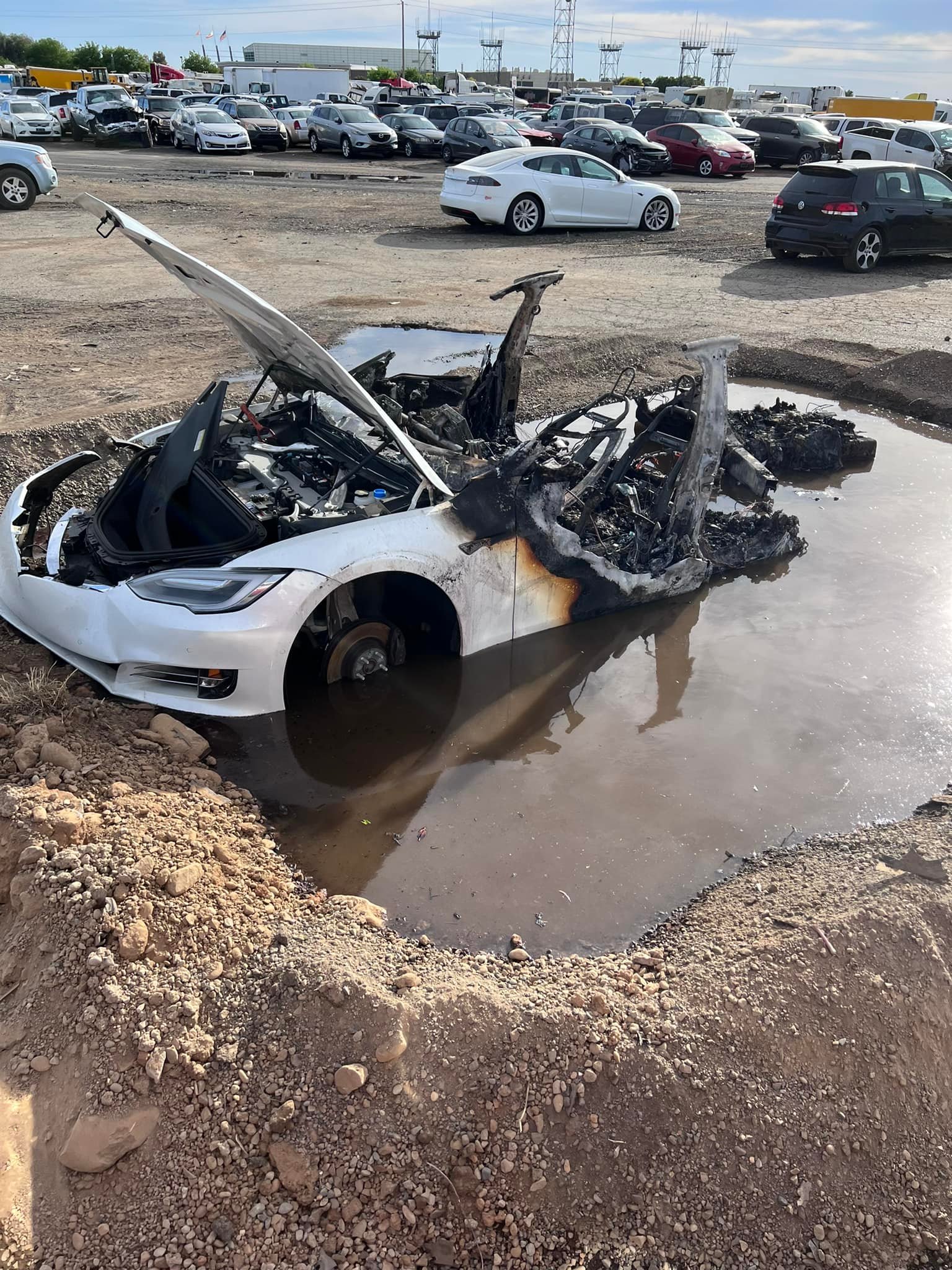 Photos: Tesla repeatedly catches fire at California wrecking yard