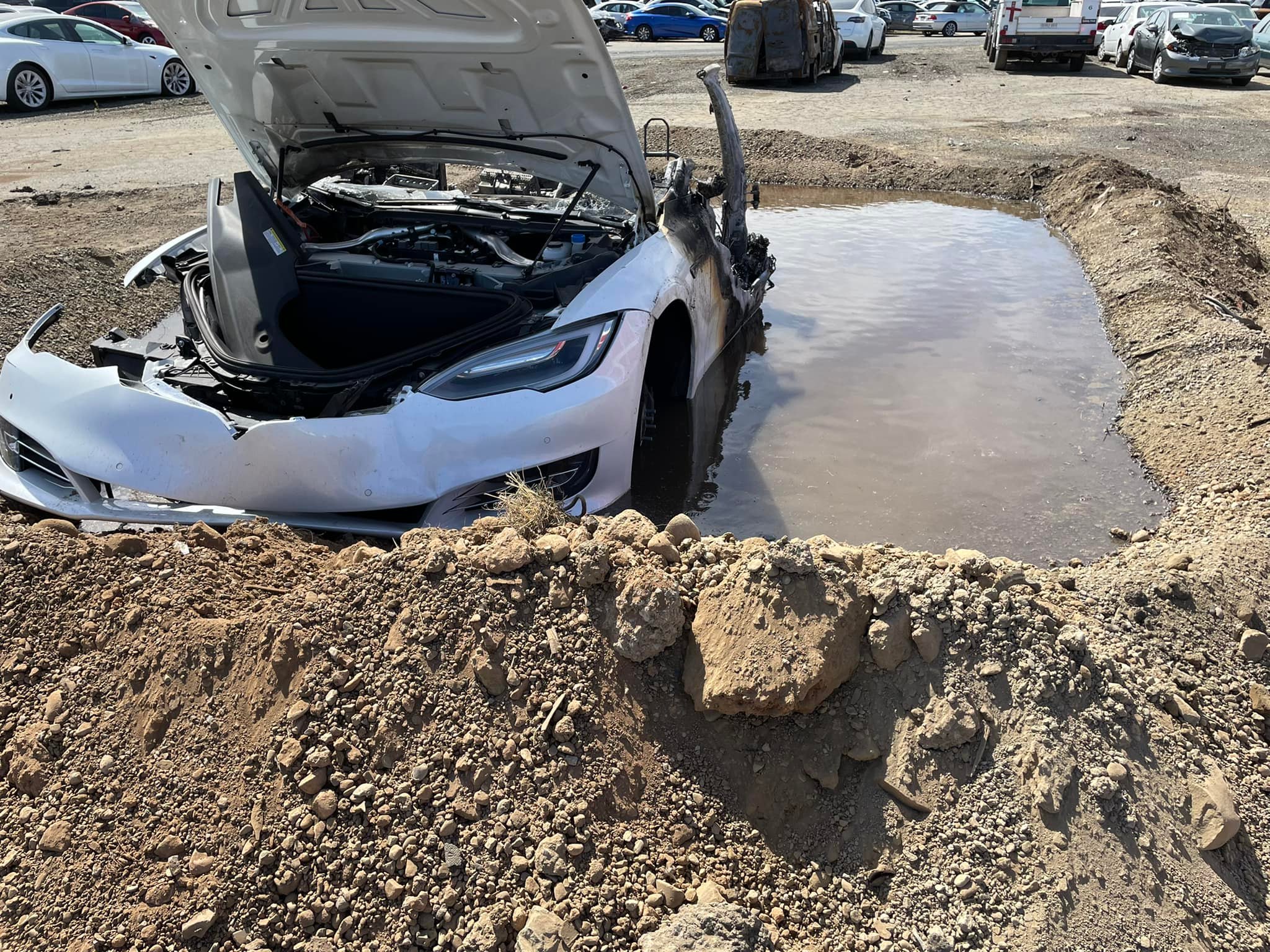 Photos: Tesla repeatedly catches fire at California wrecking yard