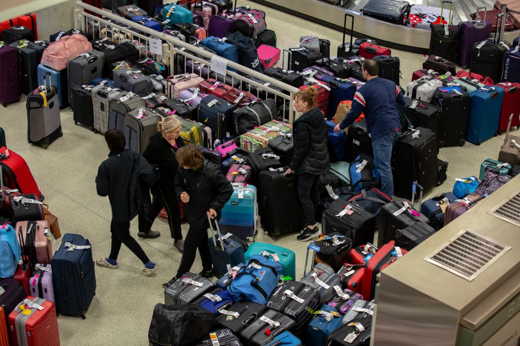 Passengers stranded, bags pile up as Southwest cancels flights