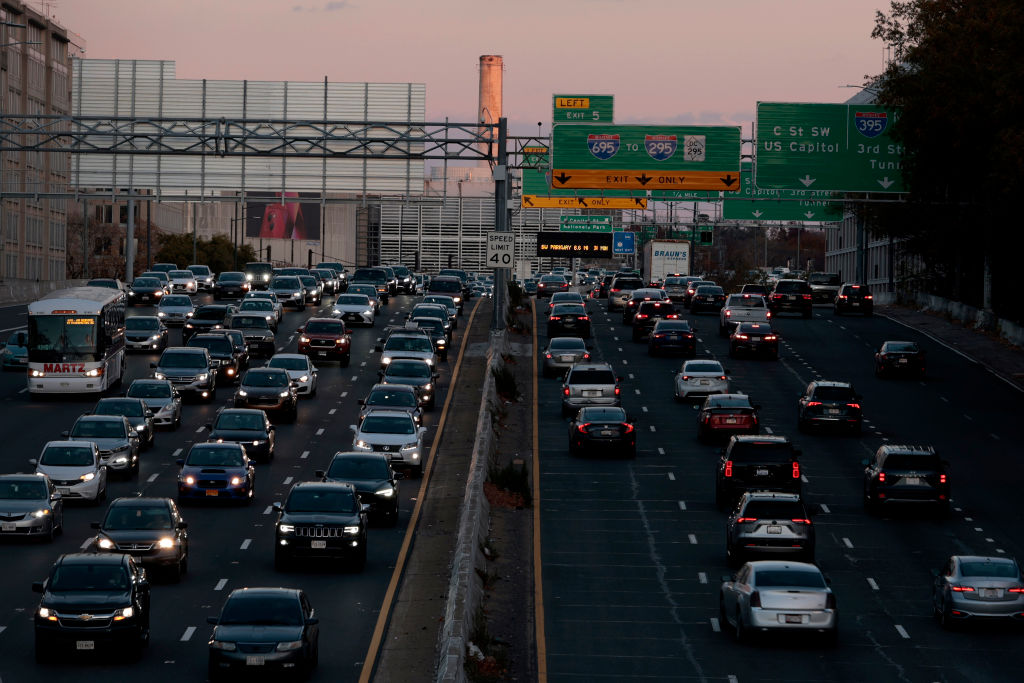 Photos: Thanksgiving travelers flock to airports, freeways ahead of holiday