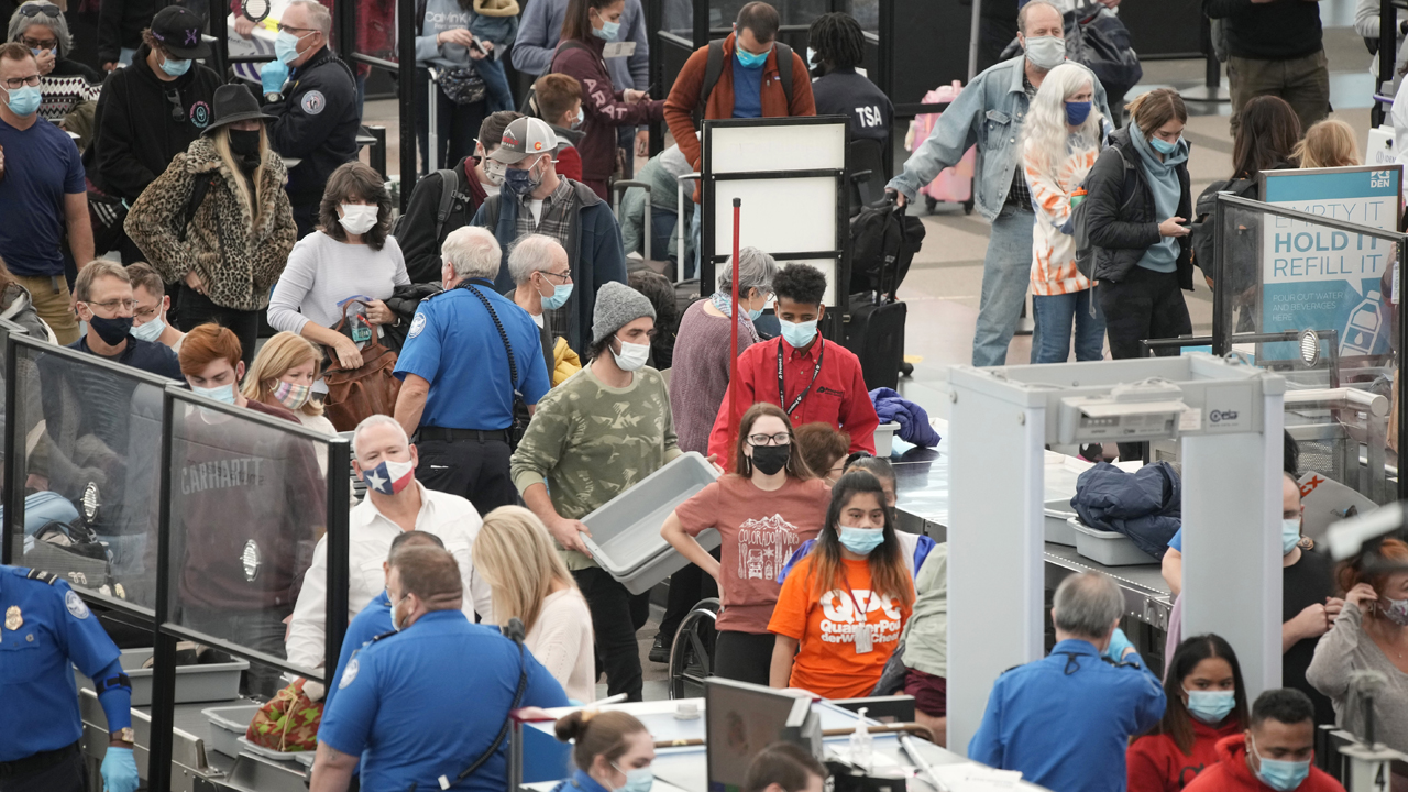Photos: Thanksgiving travelers flock to airports, freeways ahead of holiday