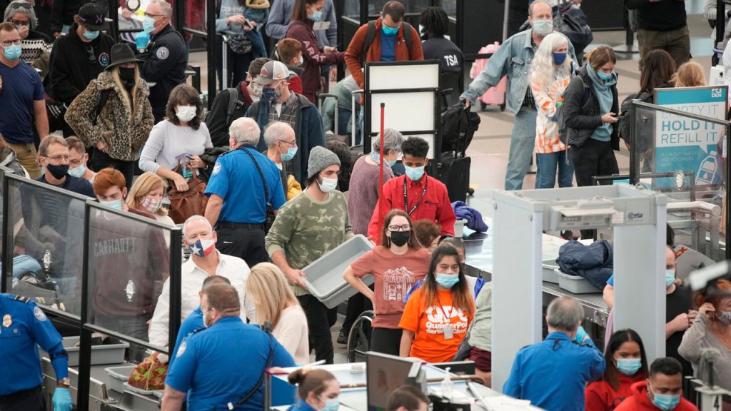 Photos: Thanksgiving travelers flock to airports, freeways ahead of holiday