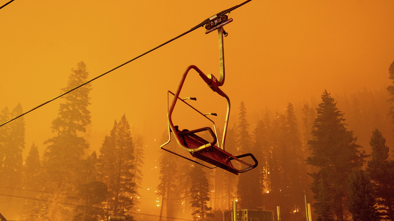 Photos: California's Caldor Fire triggers evacuations near Lake Tahoe