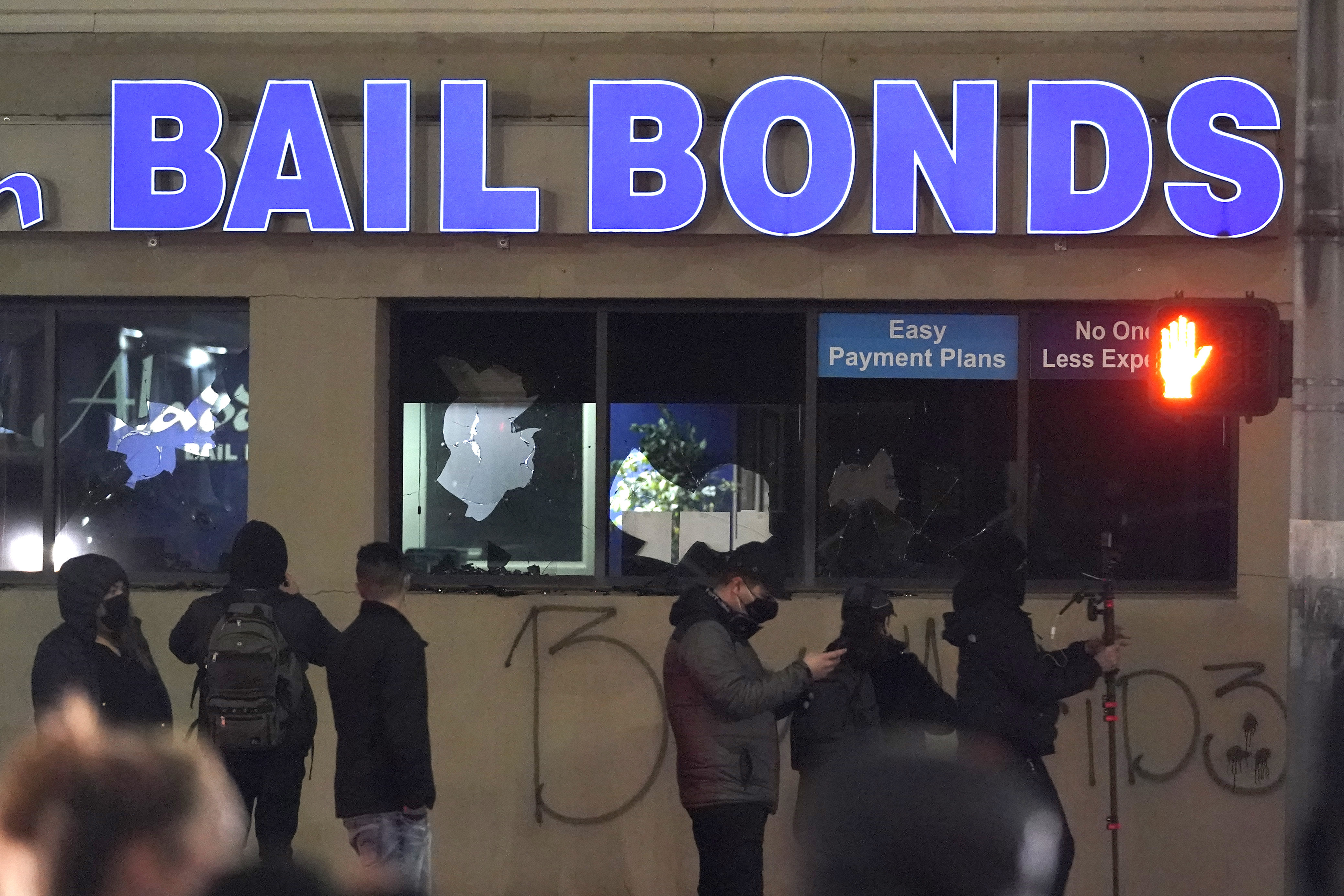 Photos: Protests erupt after police officer drives through crowd in Tacoma, Washington