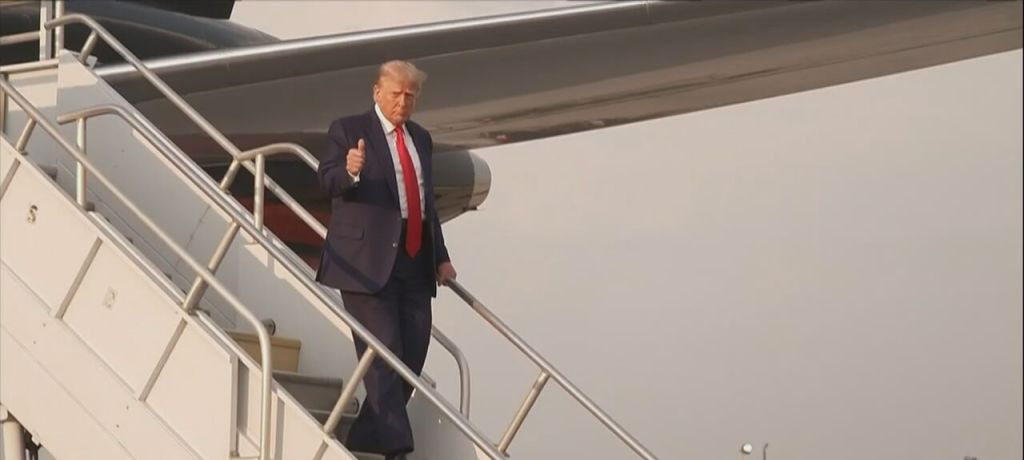 Trump getting off the plane at Hartsfield-Jackson