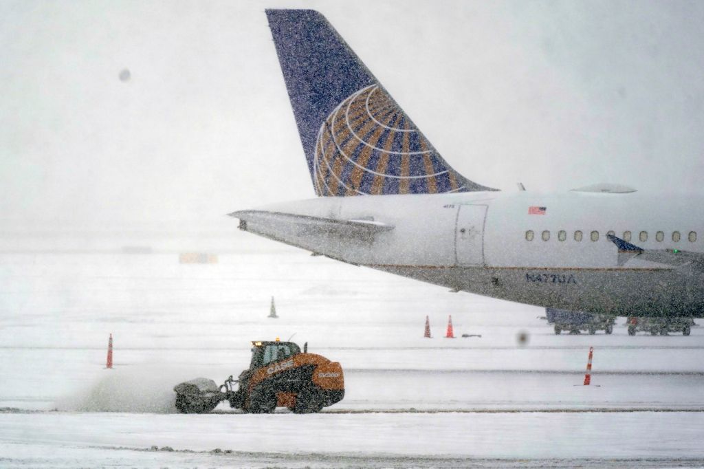 Photos: Winter storm dumps snow, ice on more states