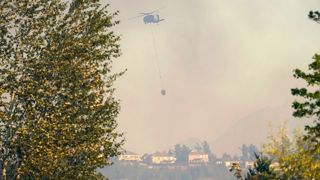 Winds fuel destructive wildfires in Pacific Northwest