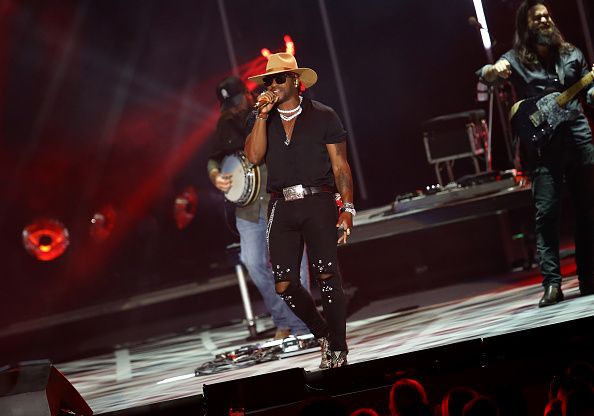 Country singer Jimmie Allen through the years.