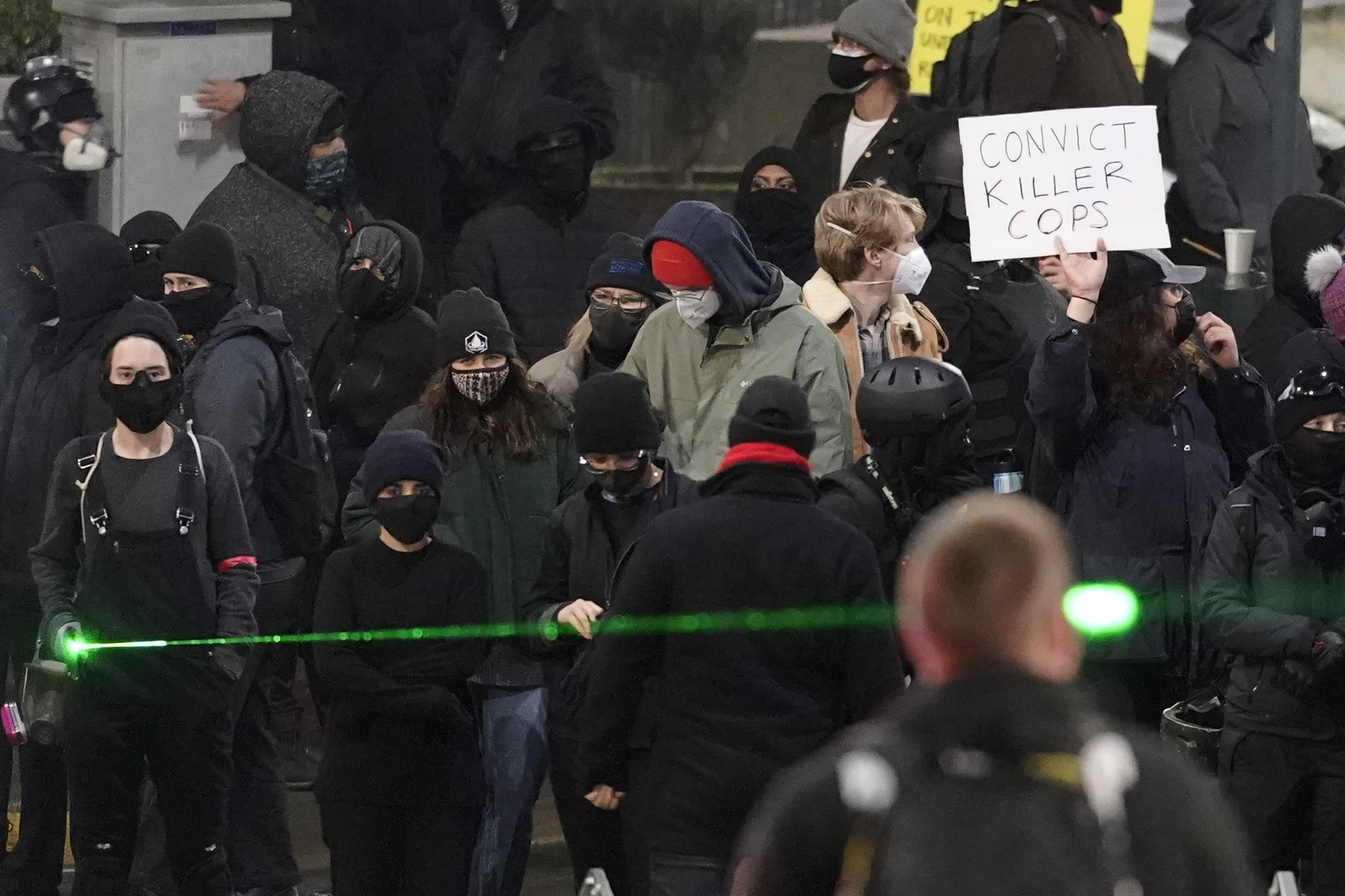 Photos: Protests erupt after police officer drives through crowd in Tacoma, Washington