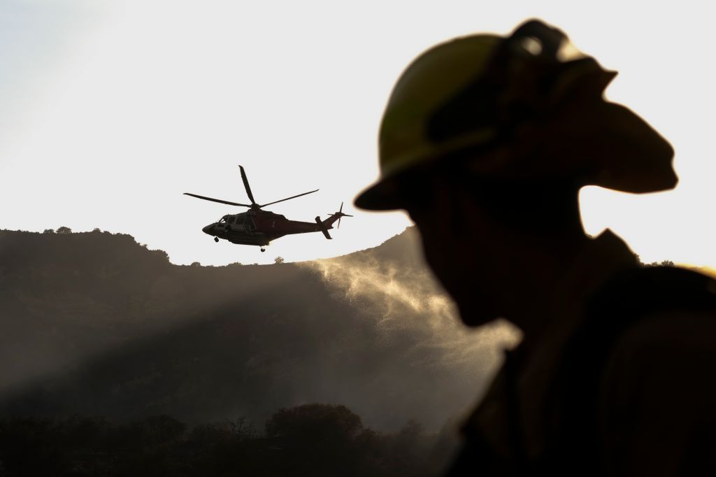 Photos: 'Palisades Fire' in California threatens homes, prompts evacuations
