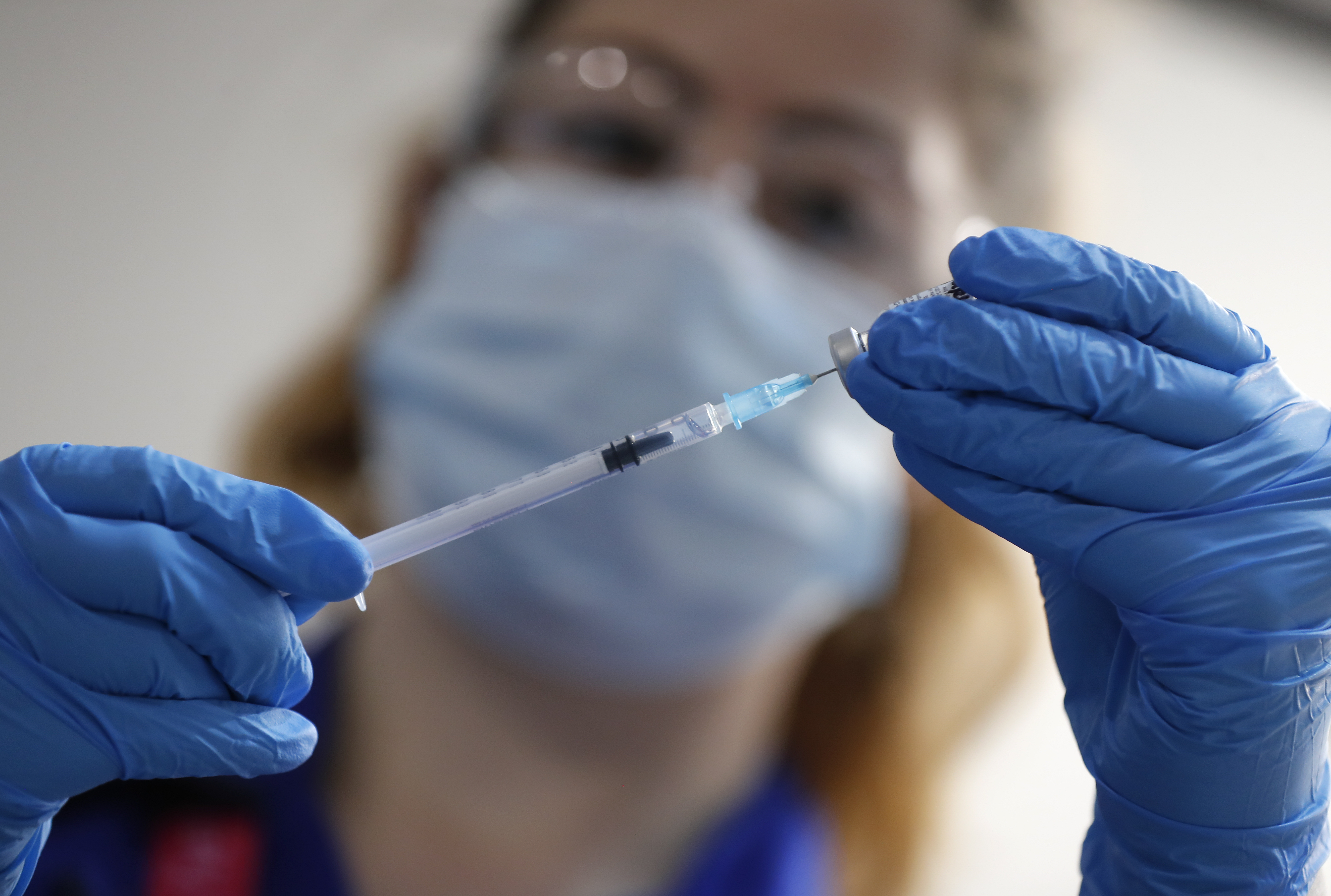 Photos: United Kingdom gives first doses of COVID-19 vaccine