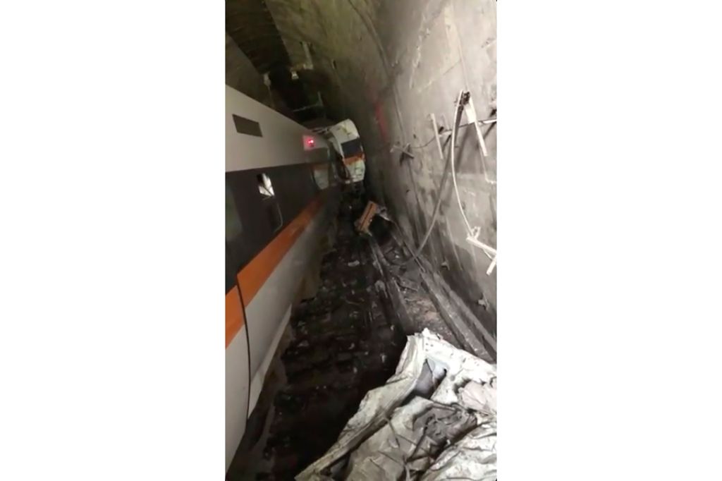 Photos: Train derails in Taiwan, killing at least 48 and injuring dozens