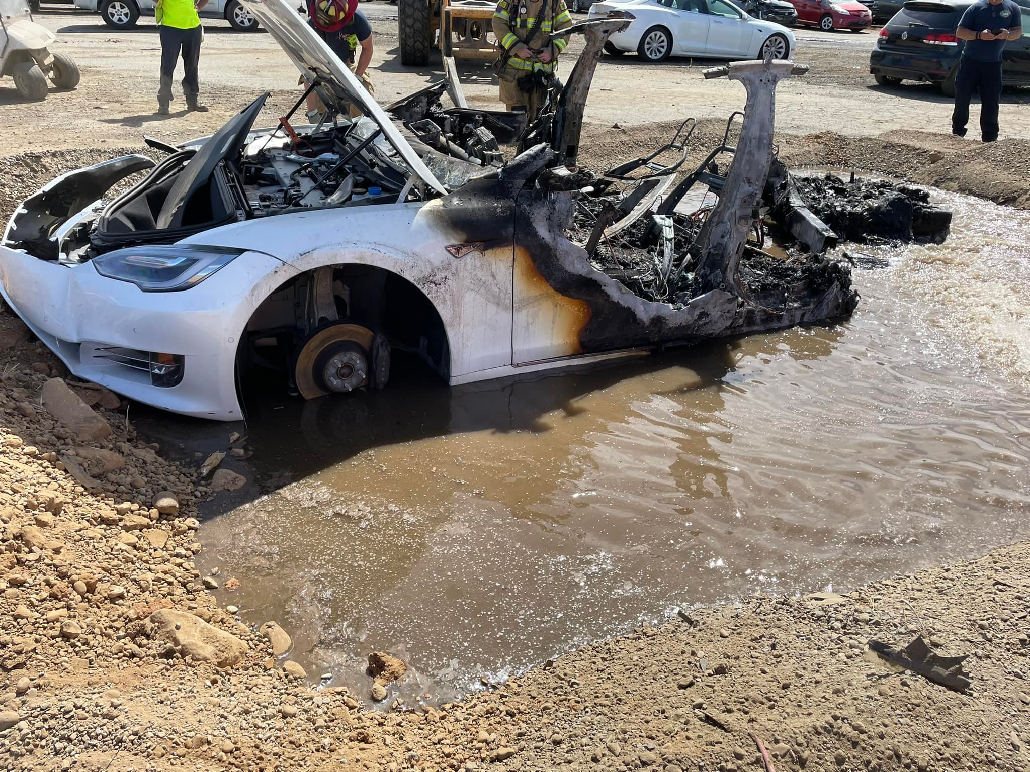 Photos: Tesla repeatedly catches fire at California wrecking yard