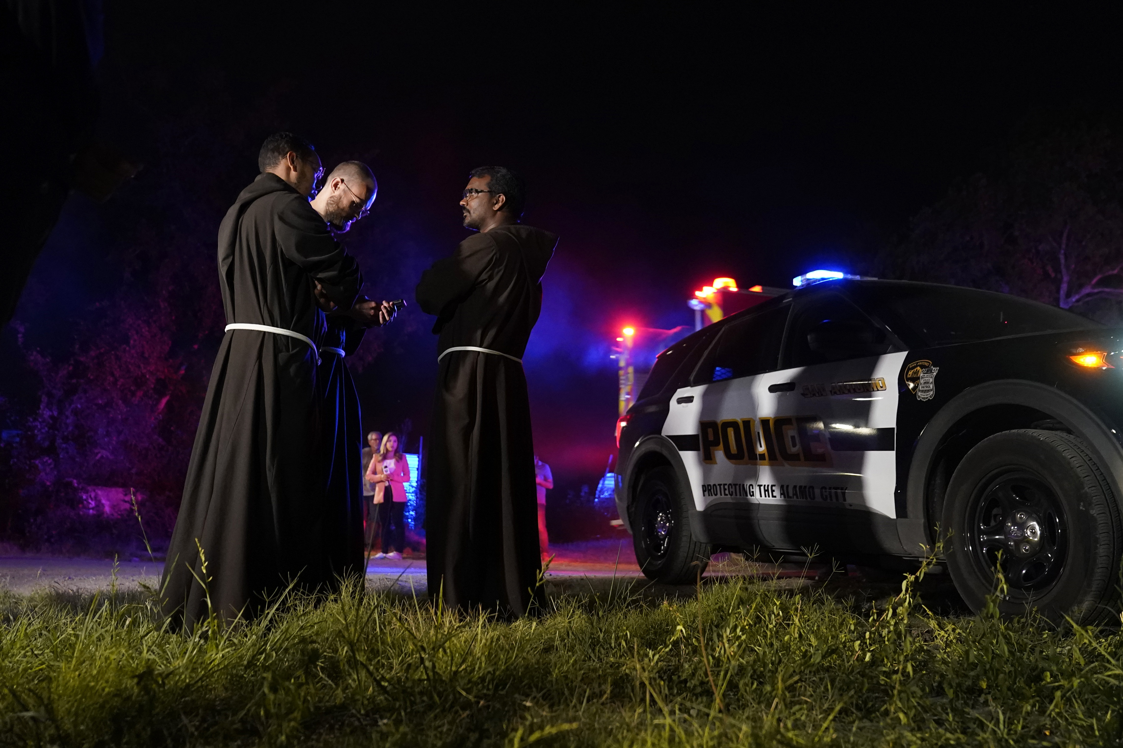 Photos: Dozens of suspected migrants found dead inside big-rig in San Antonio