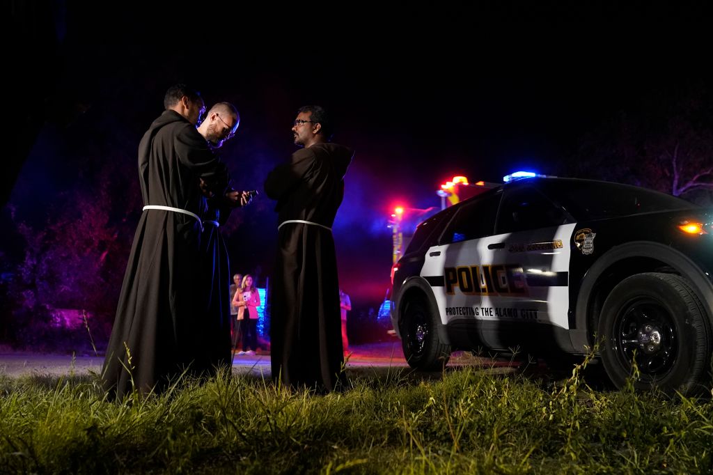 Photos: Dozens of suspected migrants found dead inside big-rig in San Antonio