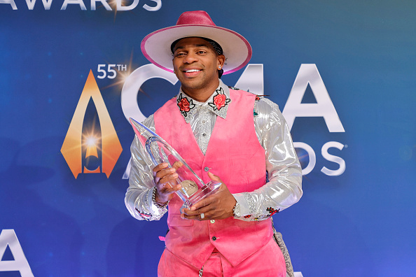 Country singer Jimmie Allen through the years.
