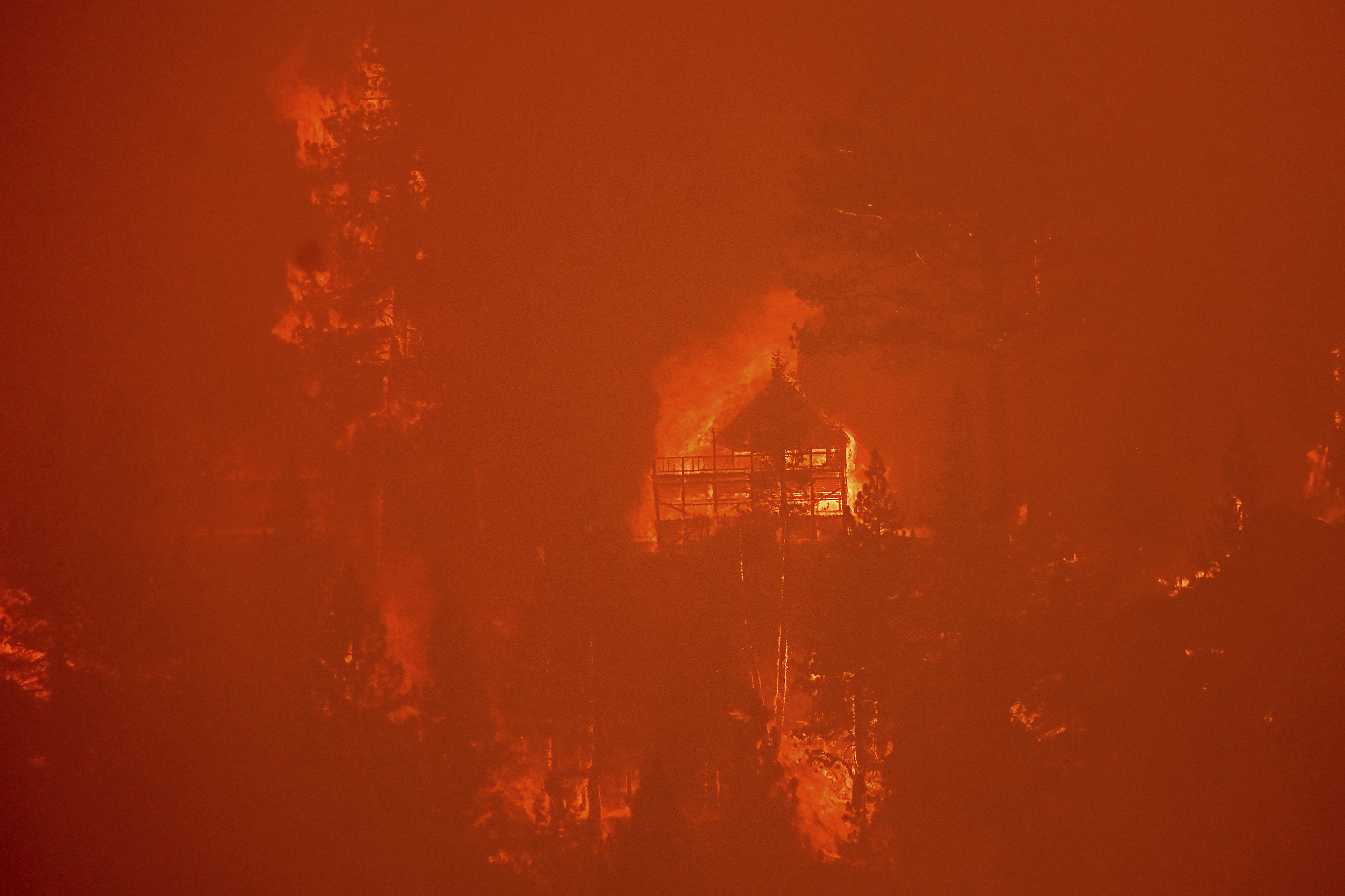 Photos: California's Caldor Fire triggers evacuations near Lake Tahoe