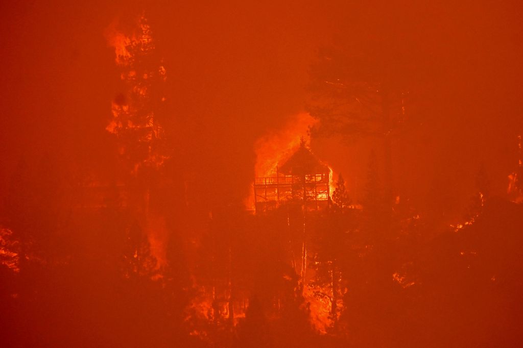 Photos: California's Caldor Fire triggers evacuations near Lake Tahoe