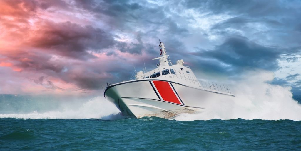 Coast Guard races to rescue of capsized boat