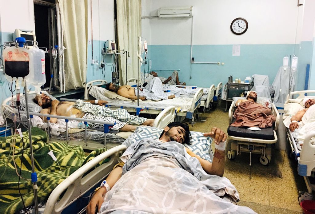 Photos: Kabul airport attack kills 13 US service members, dozens of Afghans