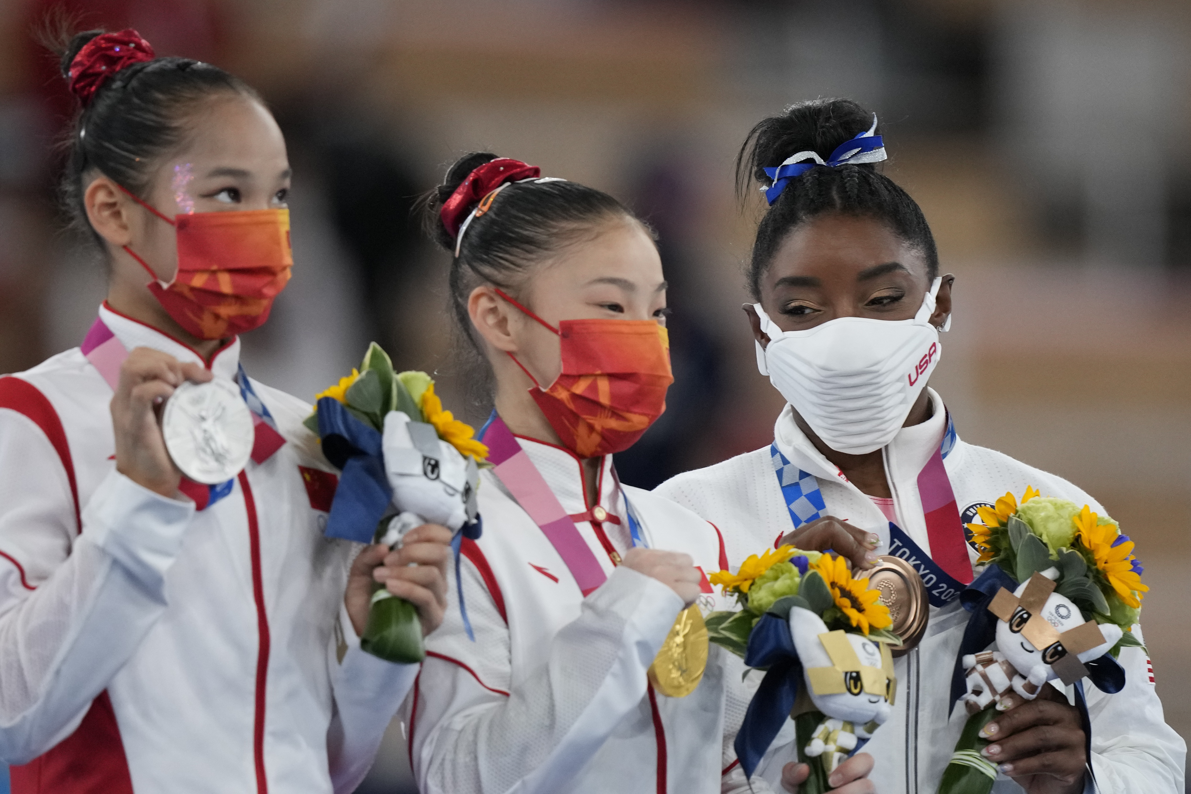 Photos: Simone Biles wins bronze in Olympic balance beam final