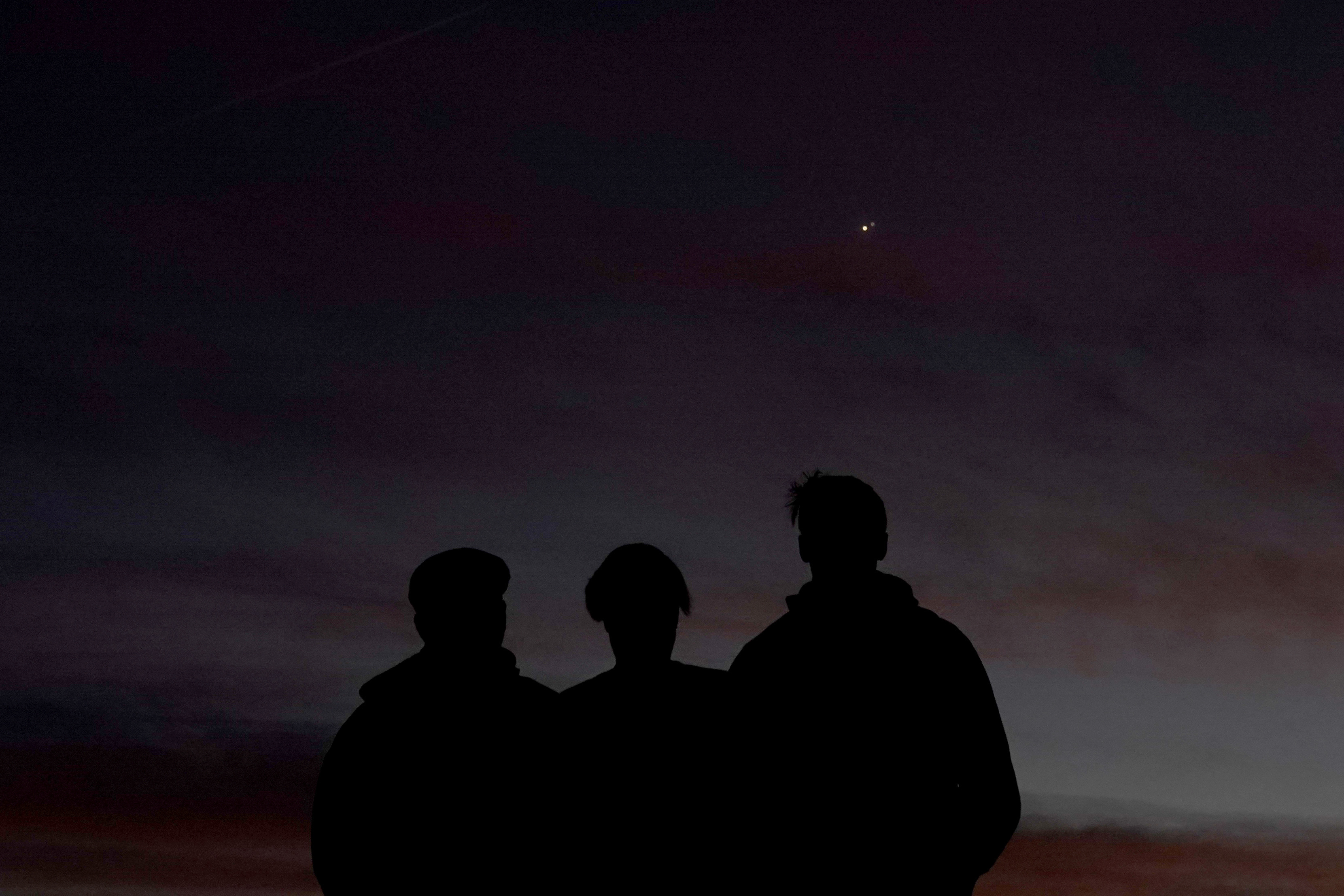 Photos: 'Christmas star' appears to shine in night sky as Saturn, Jupiter converge