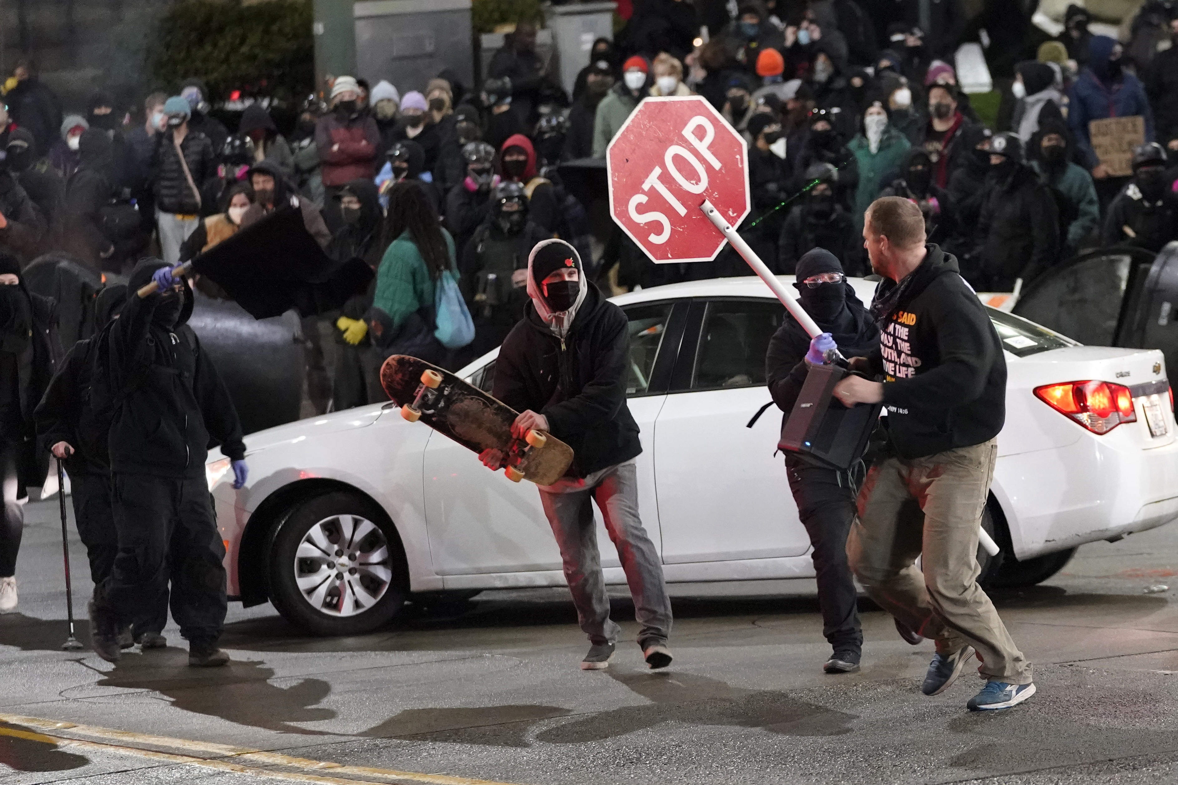 Photos: Protests erupt after police officer drives through crowd in Tacoma, Washington