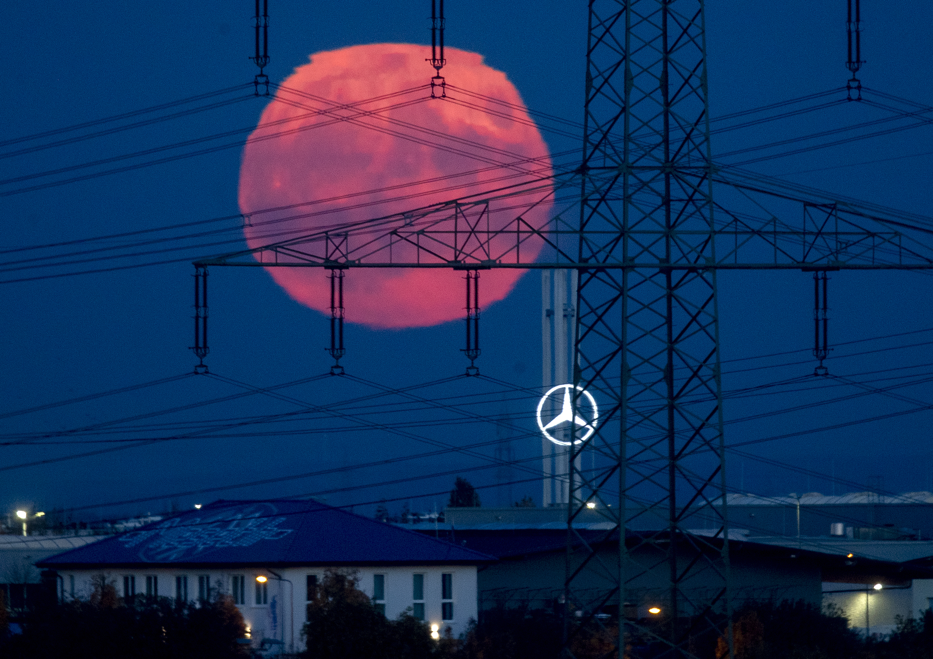 Photos: Halloween Blue Moon brightens the night sky
