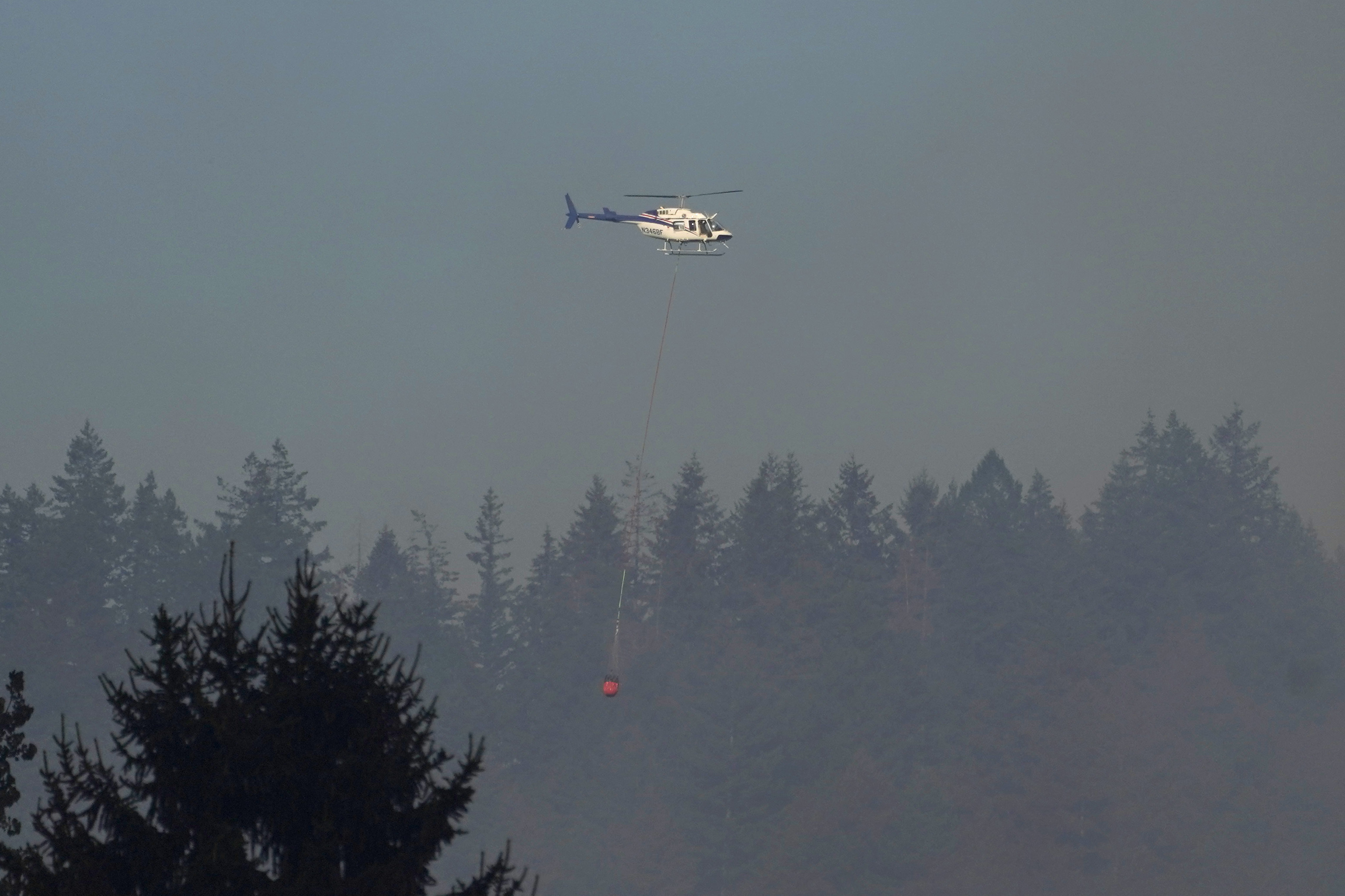 Winds fuel destructive wildfires in Pacific Northwest
