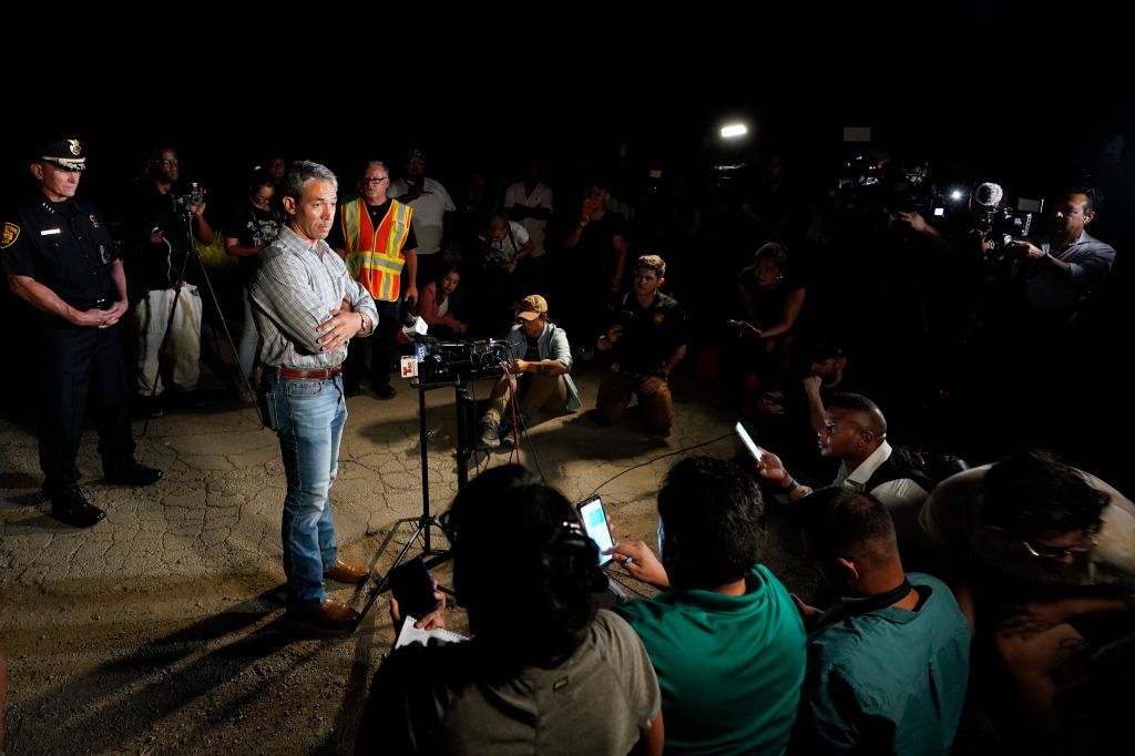 Photos: Dozens of suspected migrants found dead inside big-rig in San Antonio