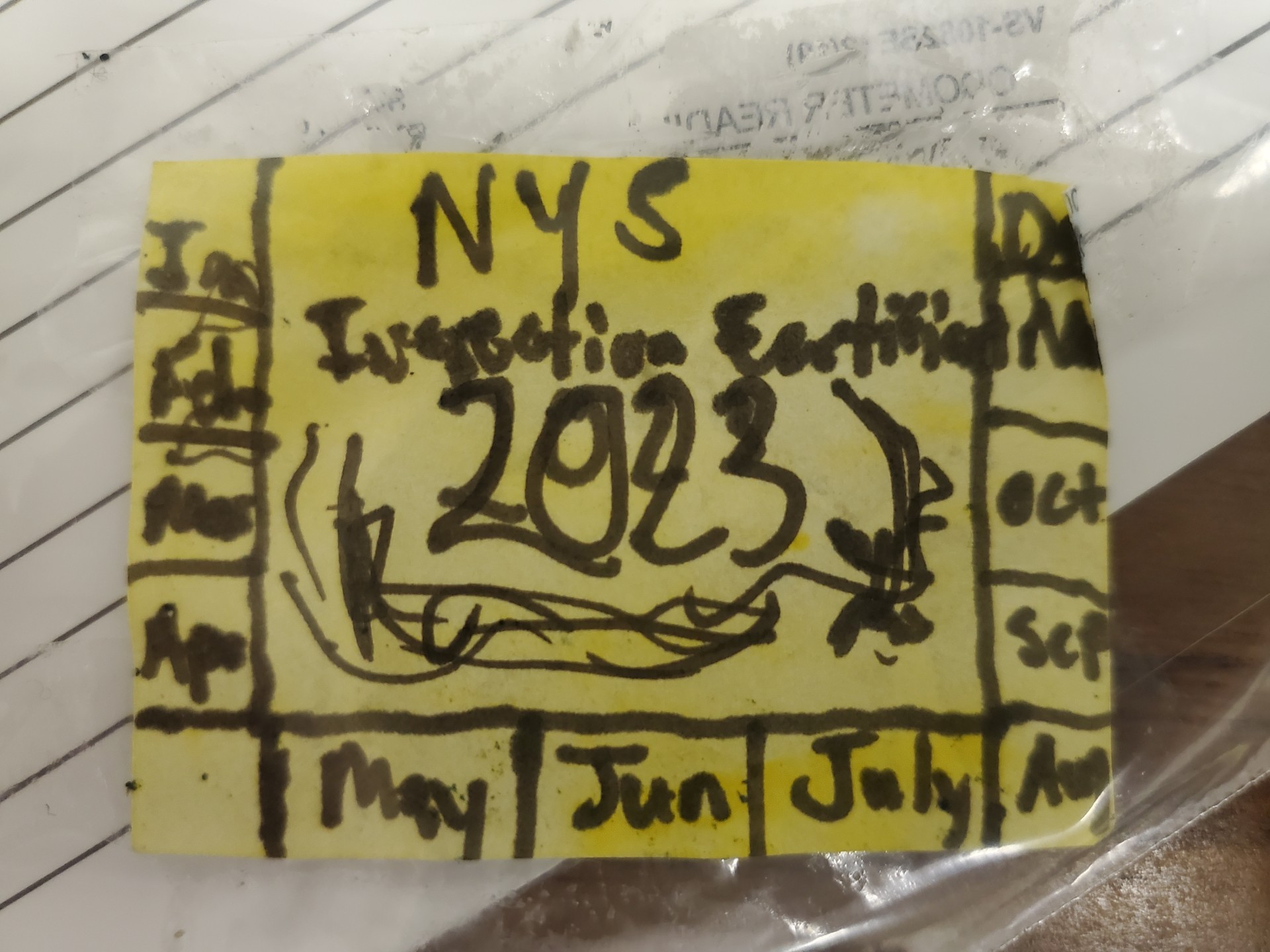 New York man arrested for crudely drawn inspection sticker on car
