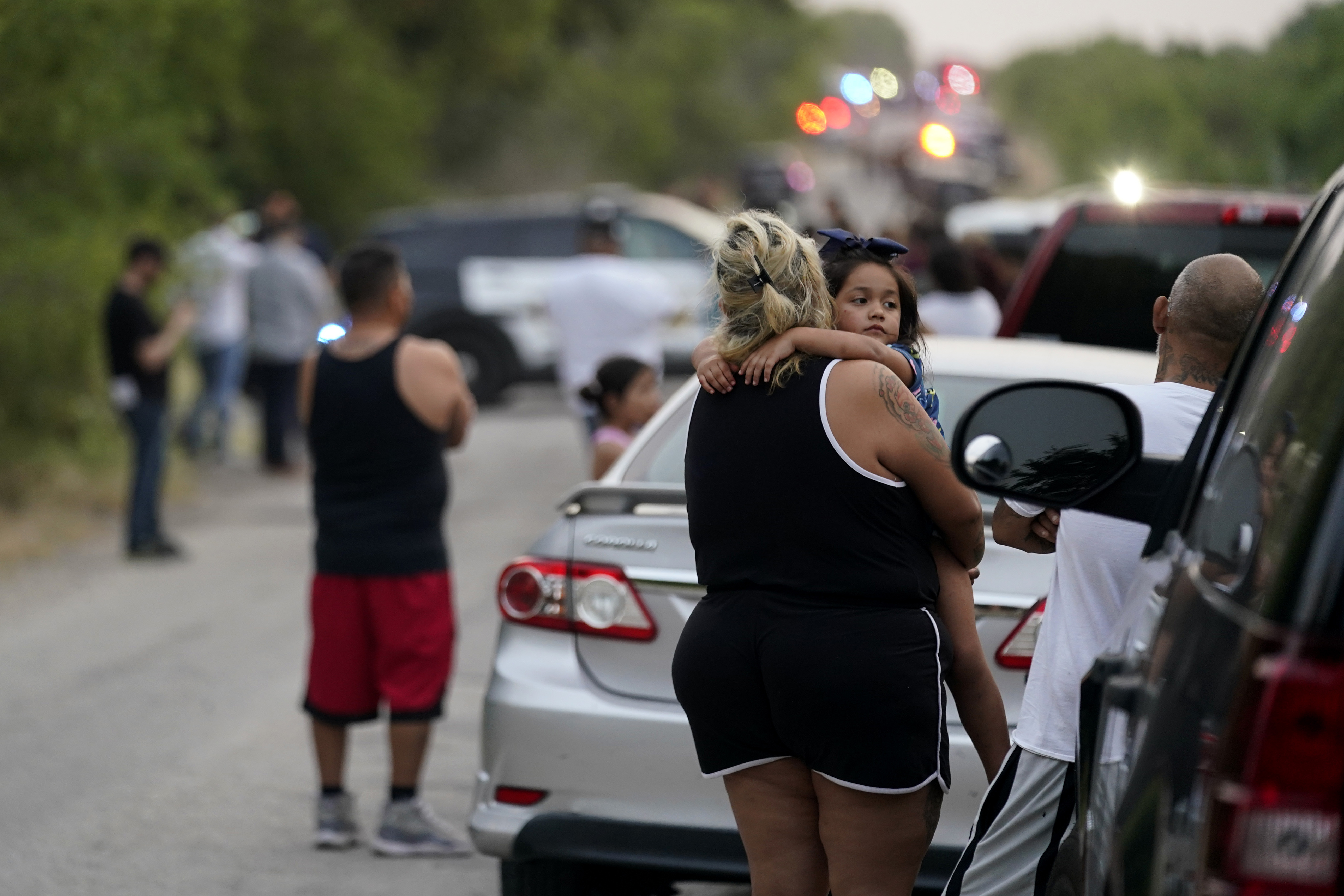Photos: Dozens of suspected migrants found dead inside big-rig in San Antonio