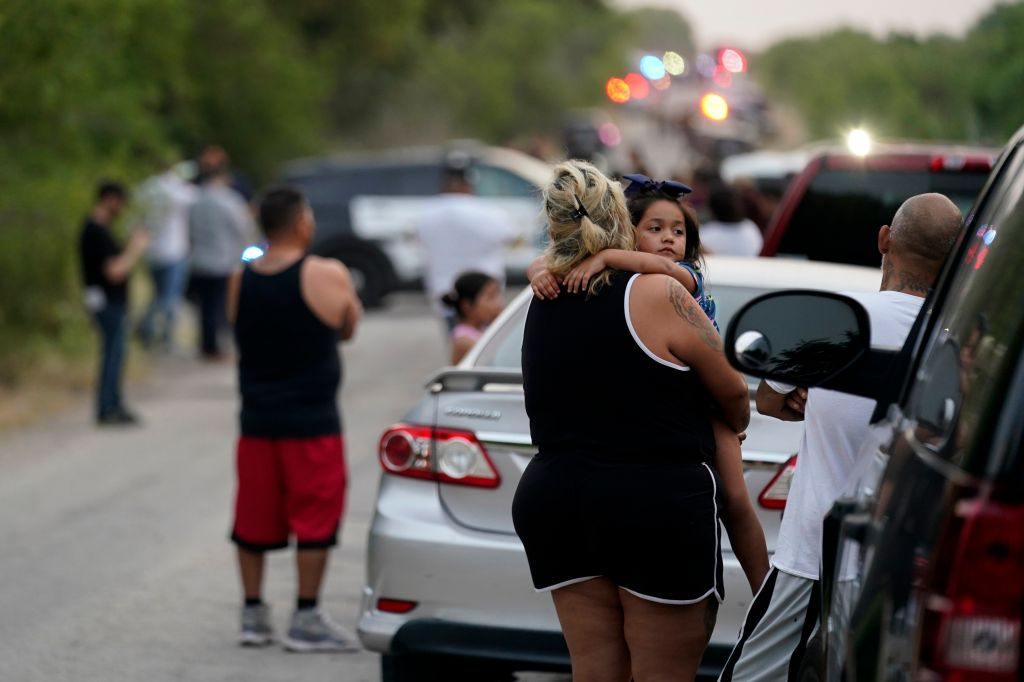 Photos: Dozens of suspected migrants found dead inside big-rig in San Antonio