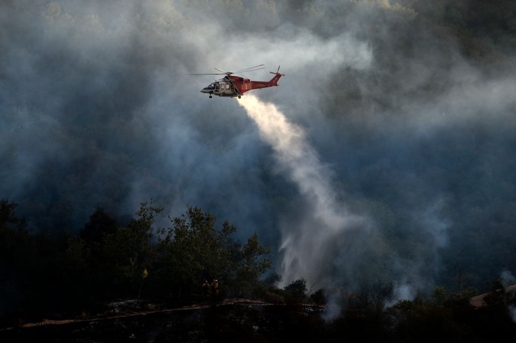 Photos: 'Palisades Fire' in California threatens homes, prompts evacuations
