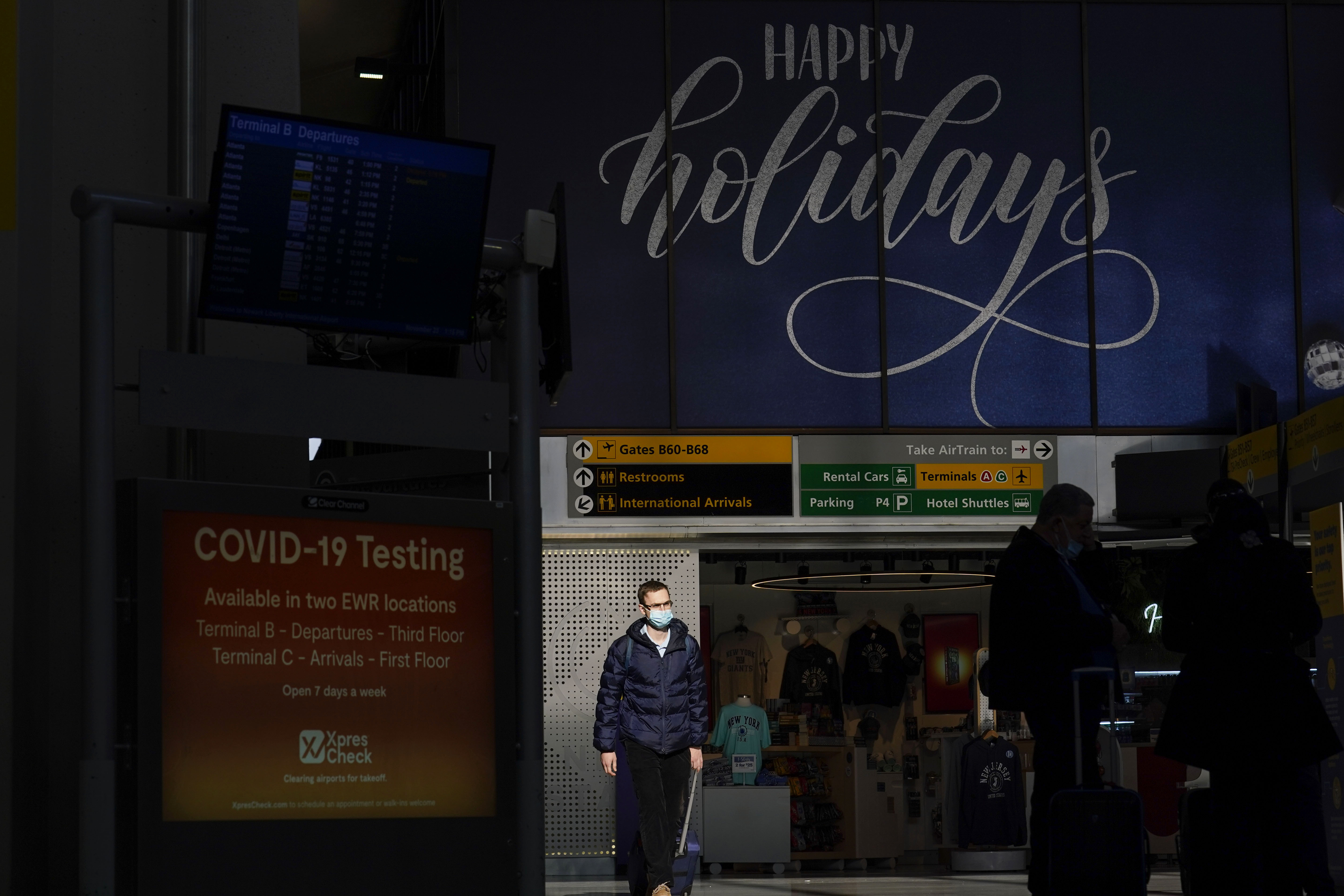 Photos: Thanksgiving travelers flock to airports, freeways ahead of holiday